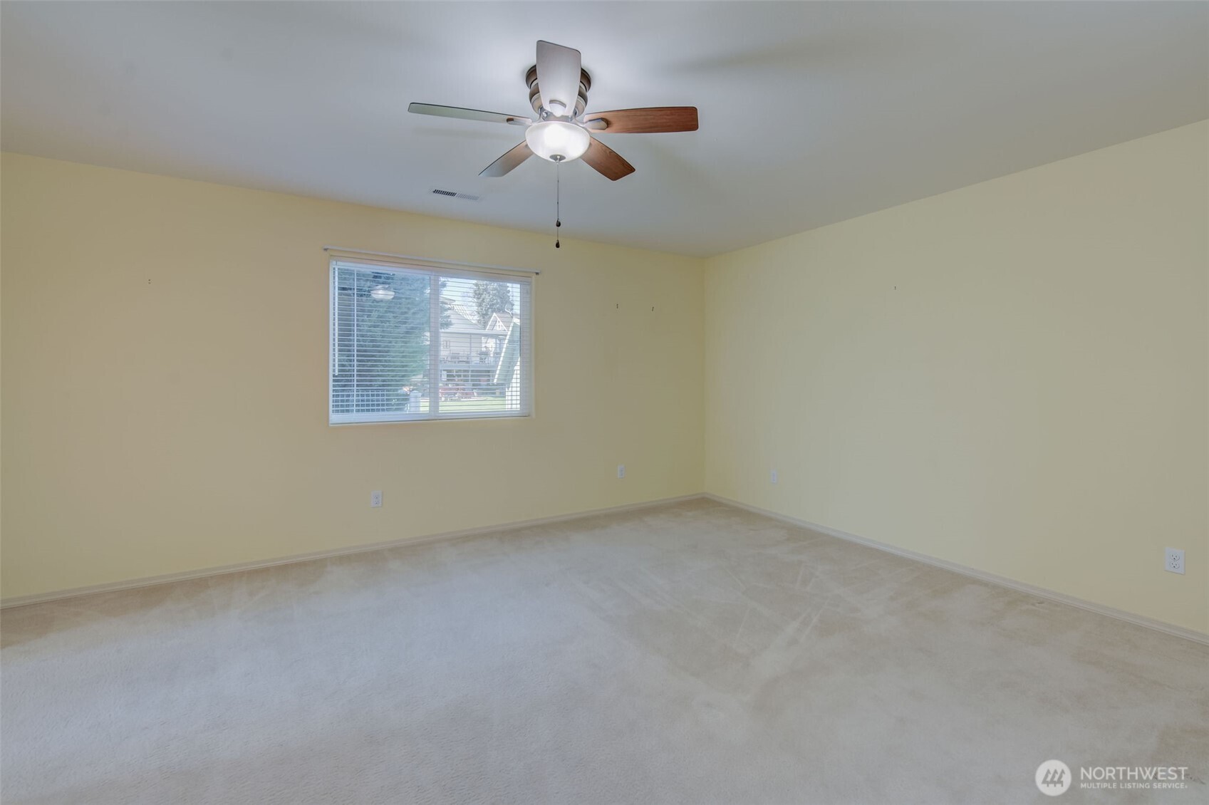 224 Vine Street Cashmere, WA 98815 - Photo 19 of 35 an empty room with a ceiling fan and window