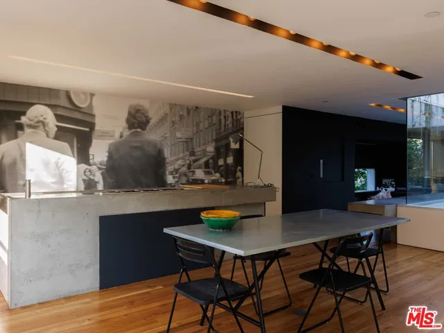 a view of outdoor space with wooden floor