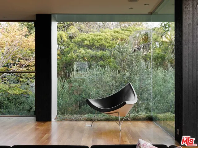 a kitchen with kitchen island a counter top space a sink and appliances