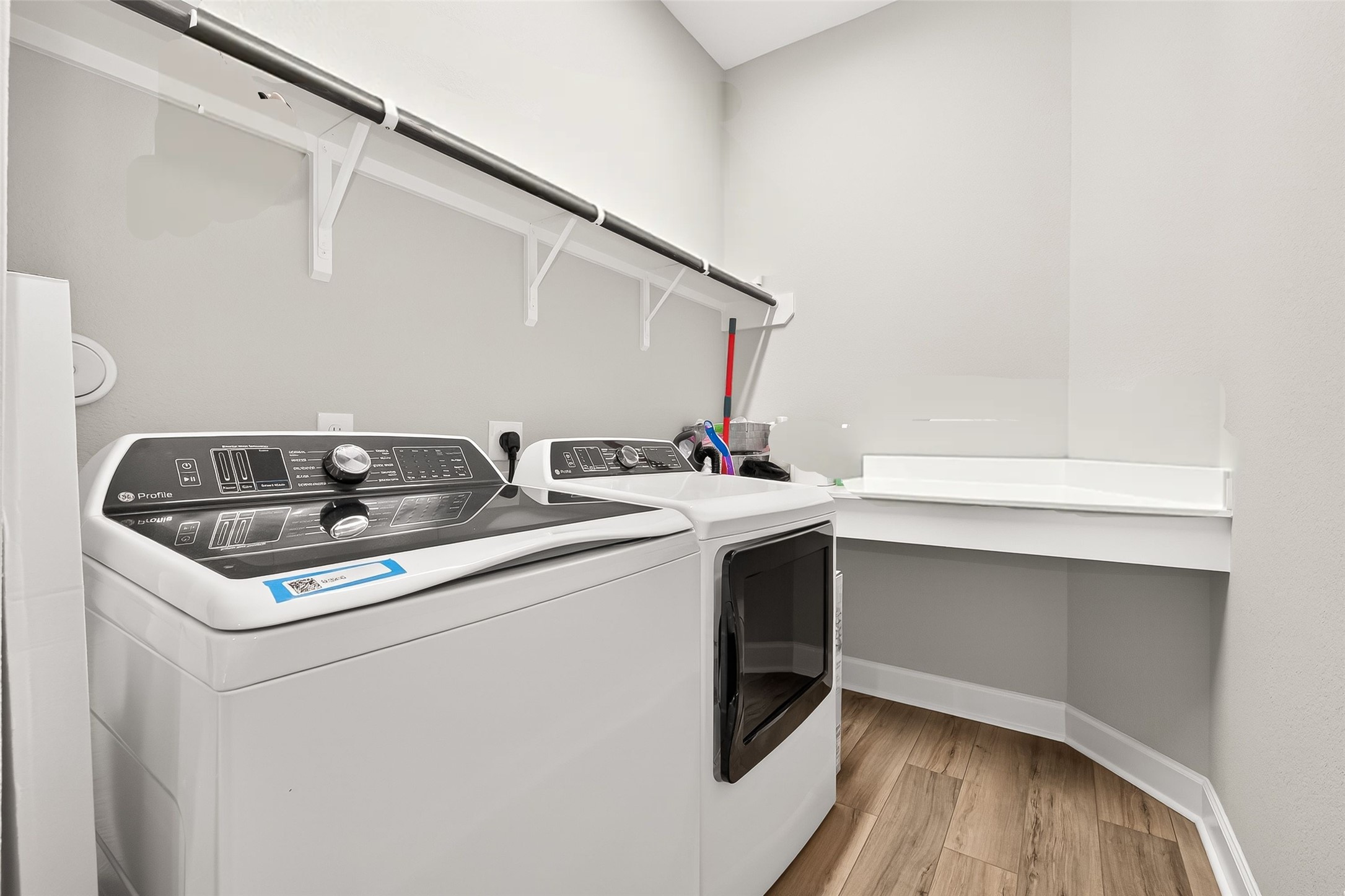 11226 Common Hackberry Street Cypress, TX 77433 - Photo 15 of 17 a utility room with dryer and washer