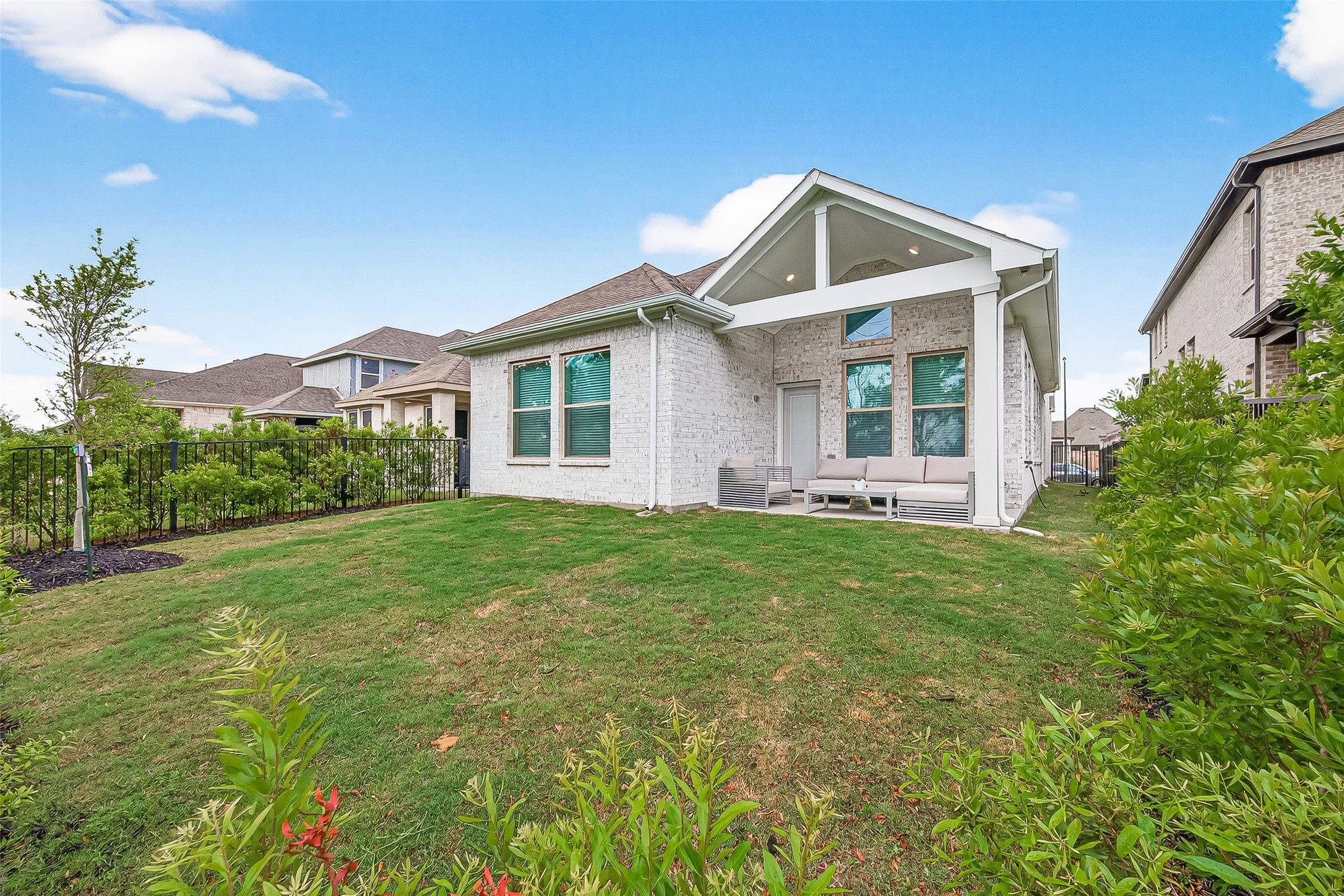11226 Common Hackberry Street Cypress, TX 77433 - Photo 16 of 17 a front view of a house with a yard
