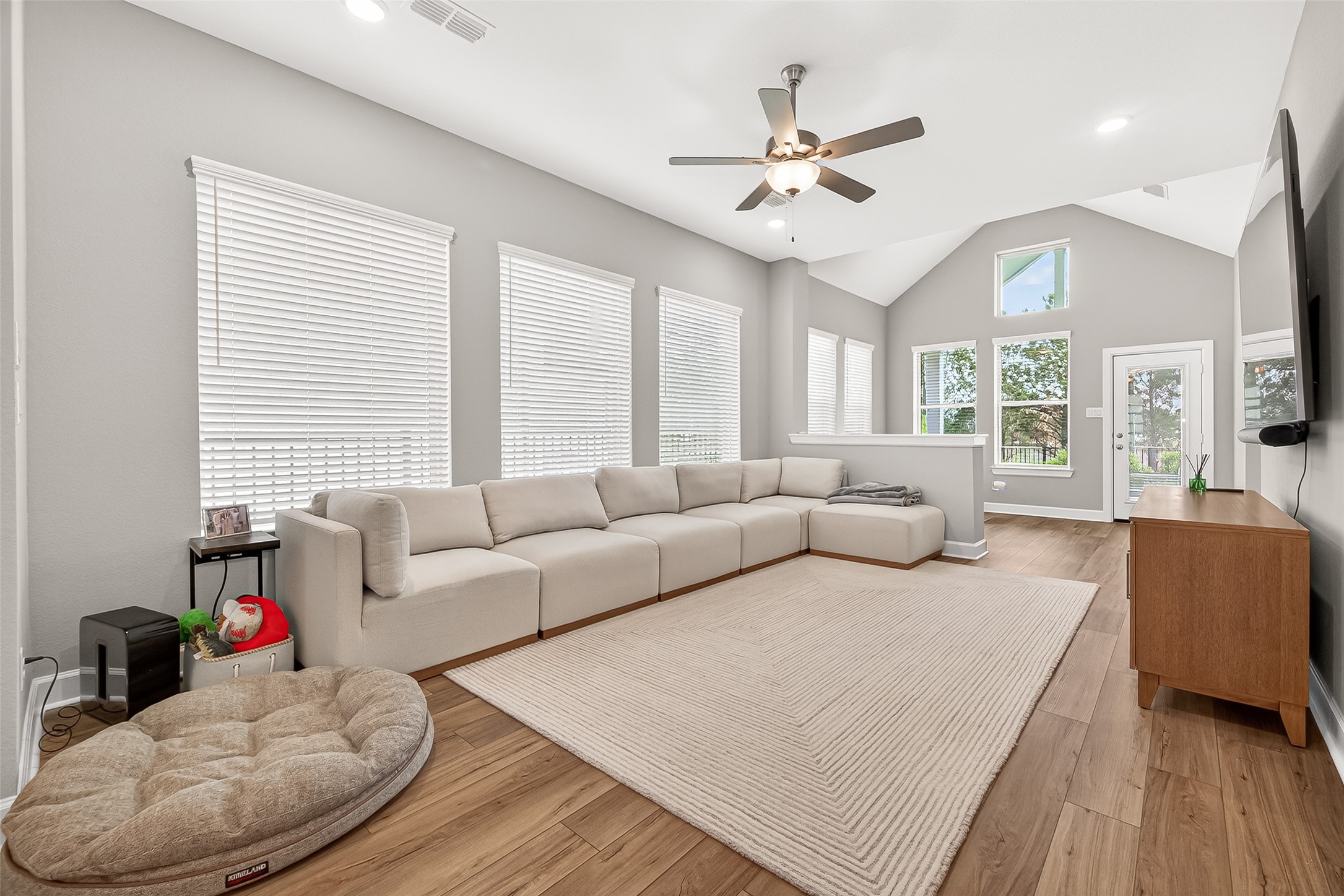 11226 Common Hackberry Street Cypress, TX 77433 - Photo 2 of 17 a living room with furniture and a large window