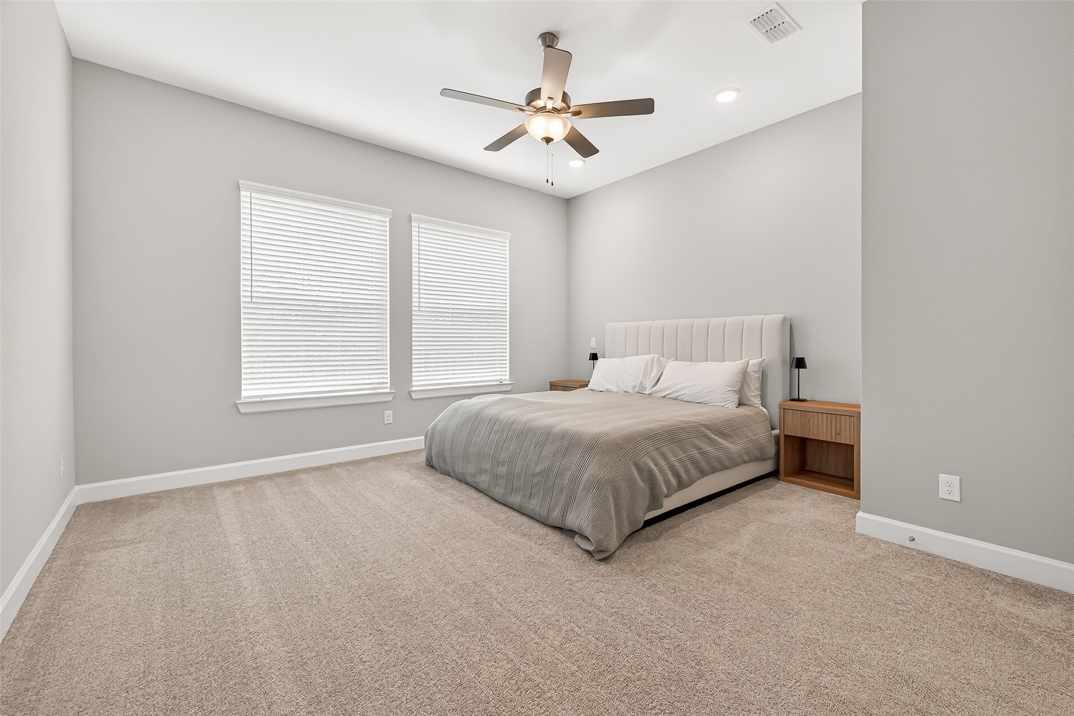 11226 Common Hackberry Street Cypress, TX 77433 - Photo 8 of 17 a spacious bedroom with a bed and window