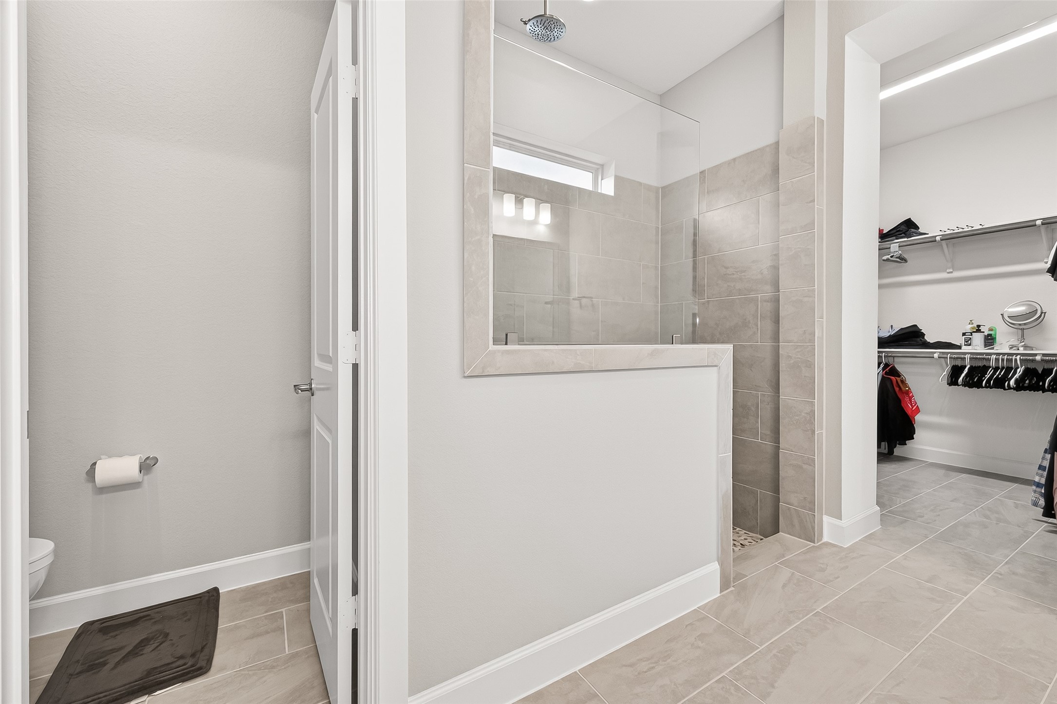 11226 Common Hackberry Street Cypress, TX 77433 - Photo 10 of 17 a view of walk in closet with white walls