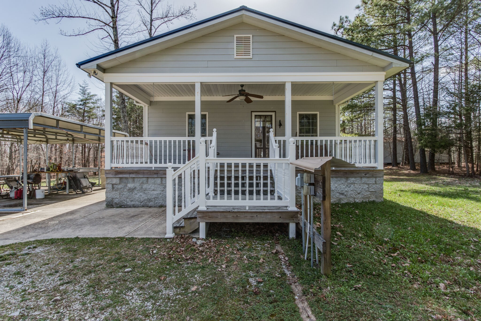 210 Double Check Lane Belvidere, TN 37306 - Photo 2 of 48 a view of a house with a yard and deck