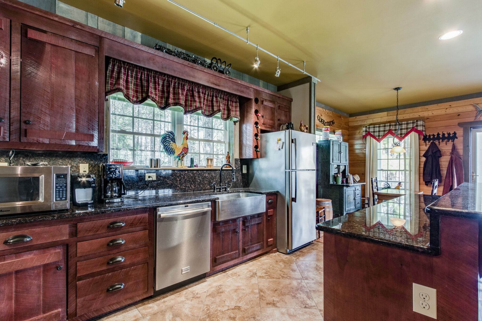 210 Double Check Lane Belvidere, TN 37306 - Photo 12 of 48 a kitchen with stainless steel appliances granite countertop a refrigerator and a stove