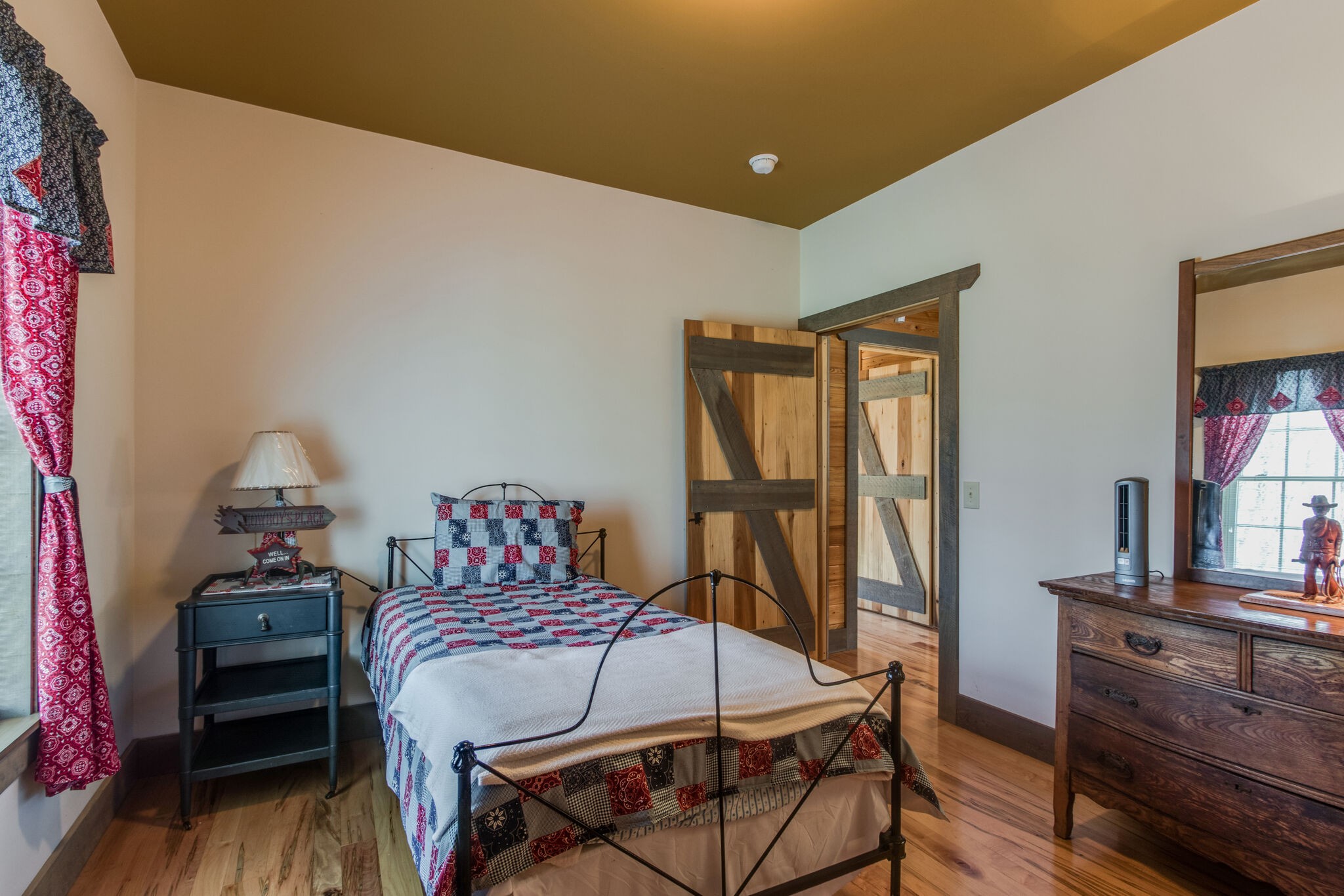 210 Double Check Lane Belvidere, TN 37306 - Photo 17 of 48 a bedroom with a bed and wooden floor