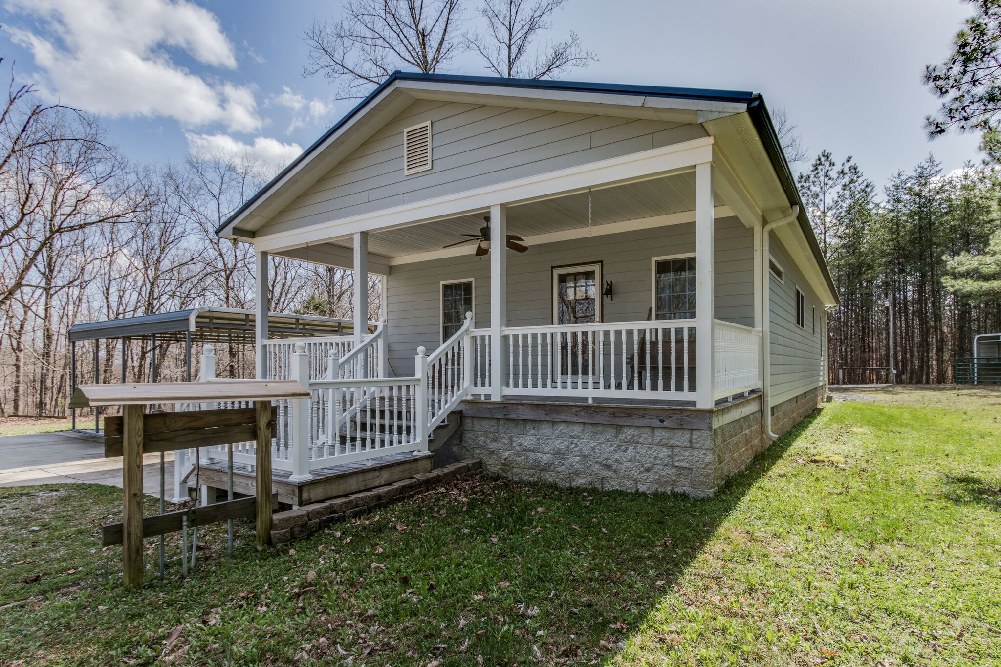 210 Double Check Lane Belvidere, TN 37306 - Photo 3 of 48 a view of a house with backyard and a deck