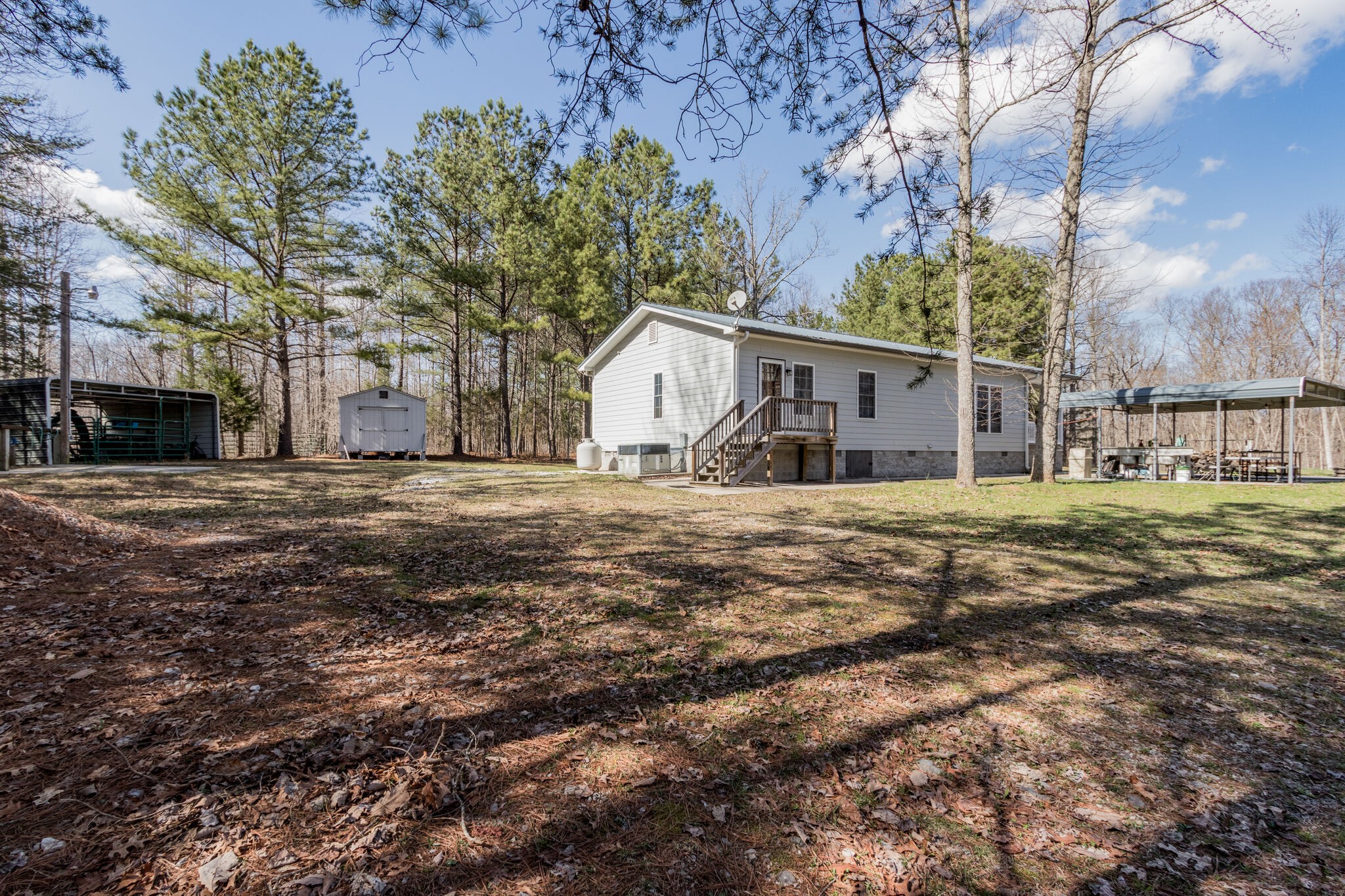 210 Double Check Lane Belvidere, TN 37306 - Photo 26 of 48 a front view of a house with a yard