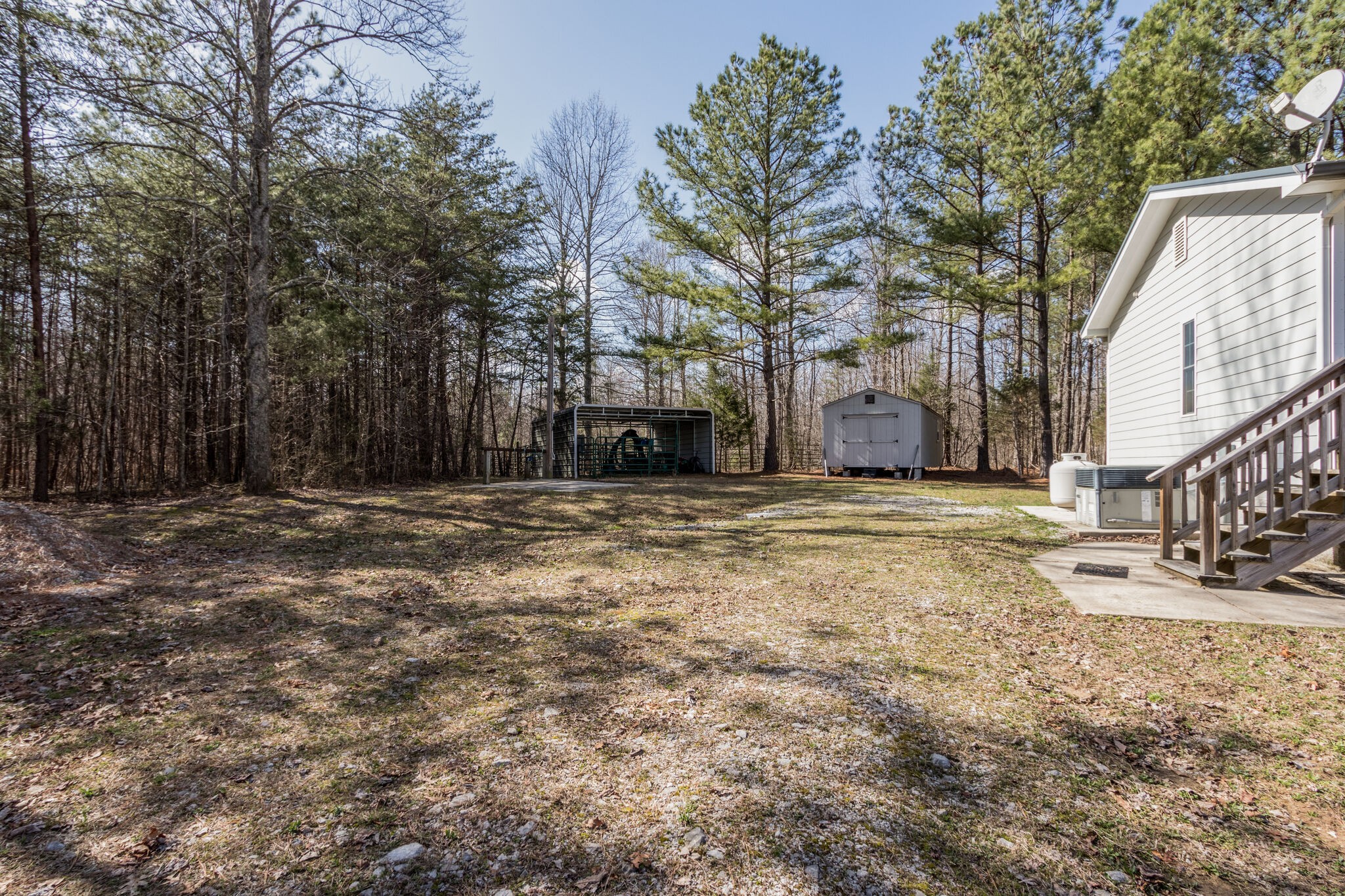 210 Double Check Lane Belvidere, TN 37306 - Photo 27 of 48 a view of a house with a yard