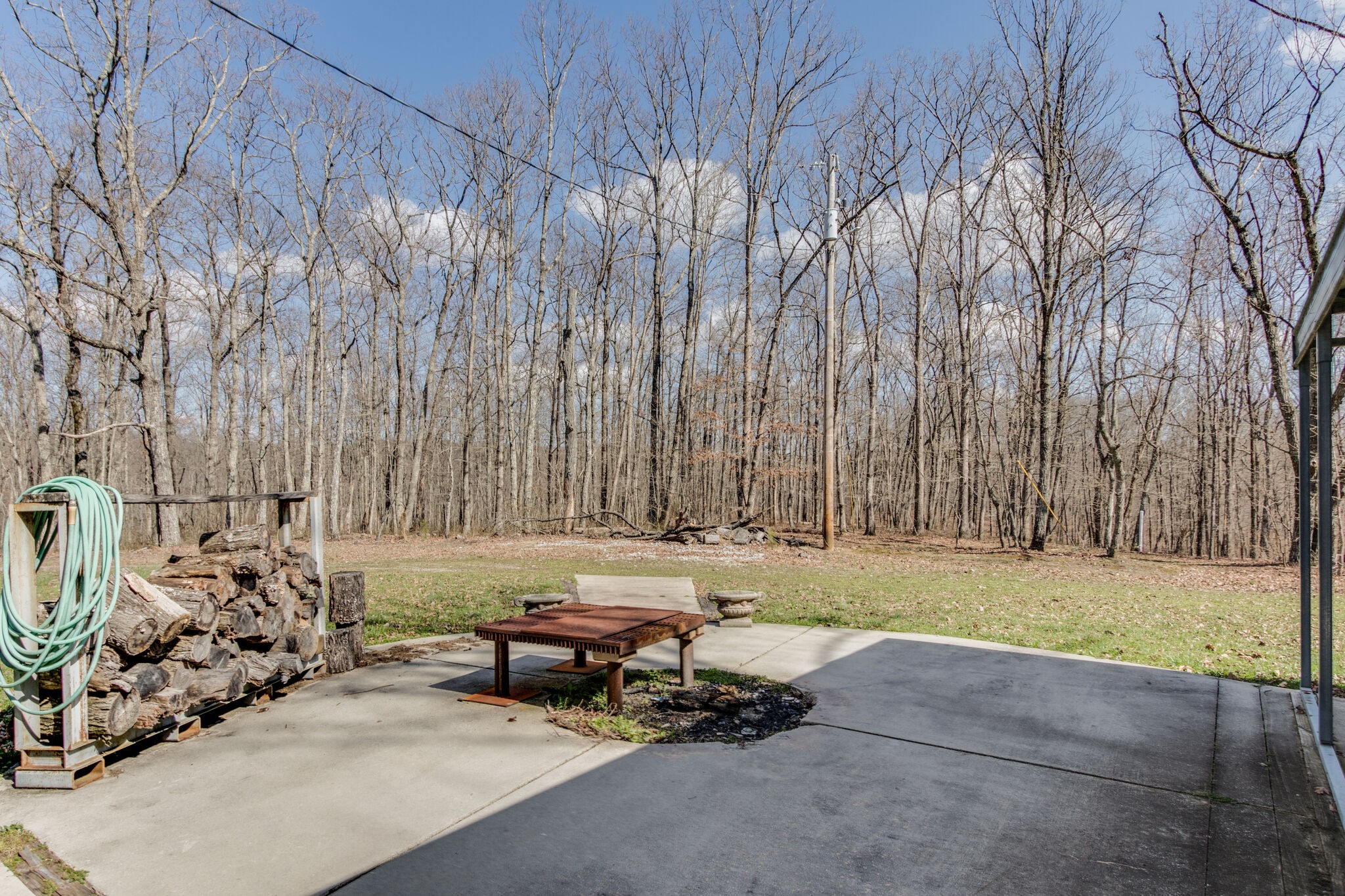 210 Double Check Lane Belvidere, TN 37306 - Photo 28 of 48 a view of a bench in a yard