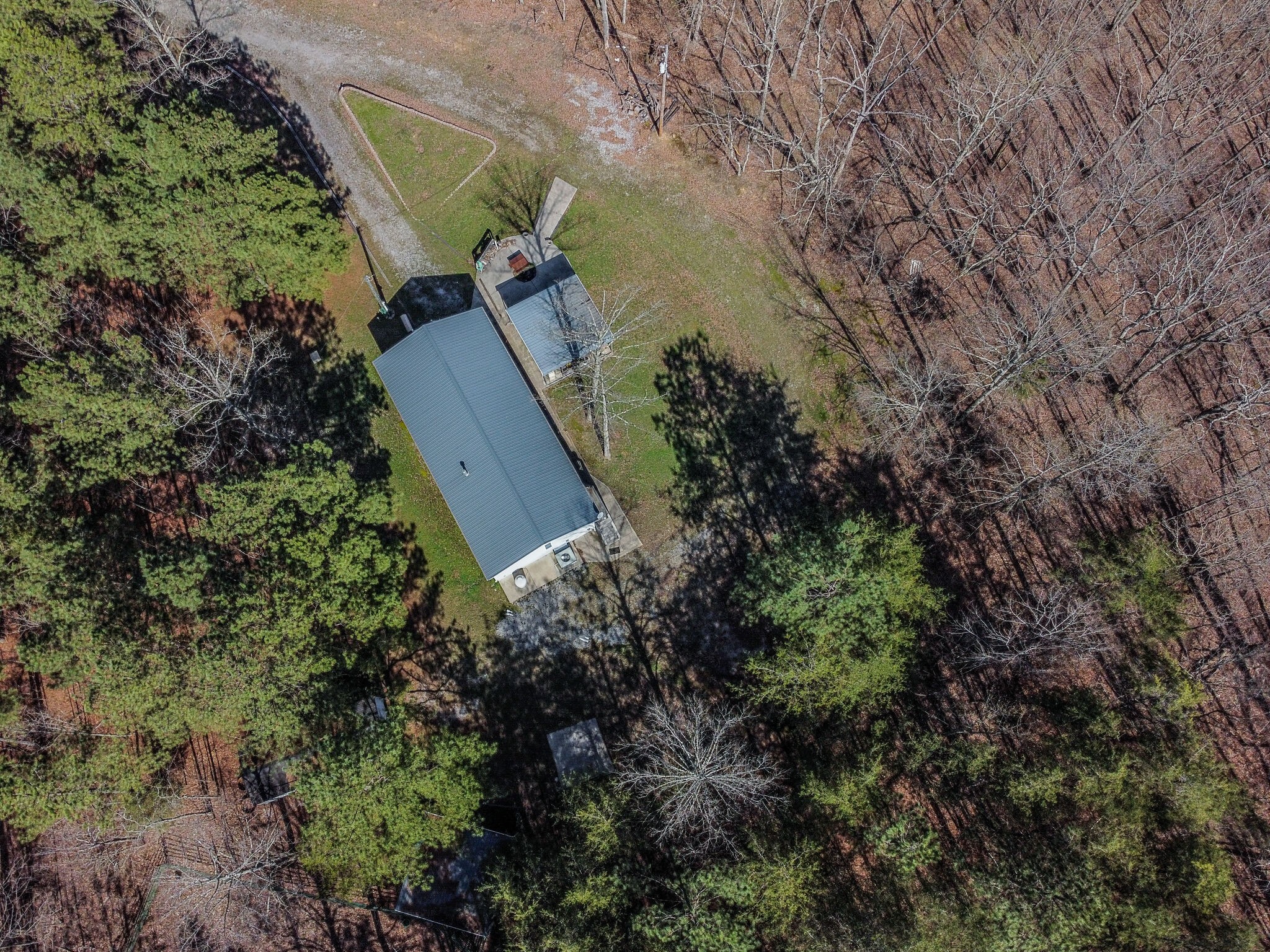 210 Double Check Lane Belvidere, TN 37306 - Photo 43 of 48 an aerial view of a house with a yard
