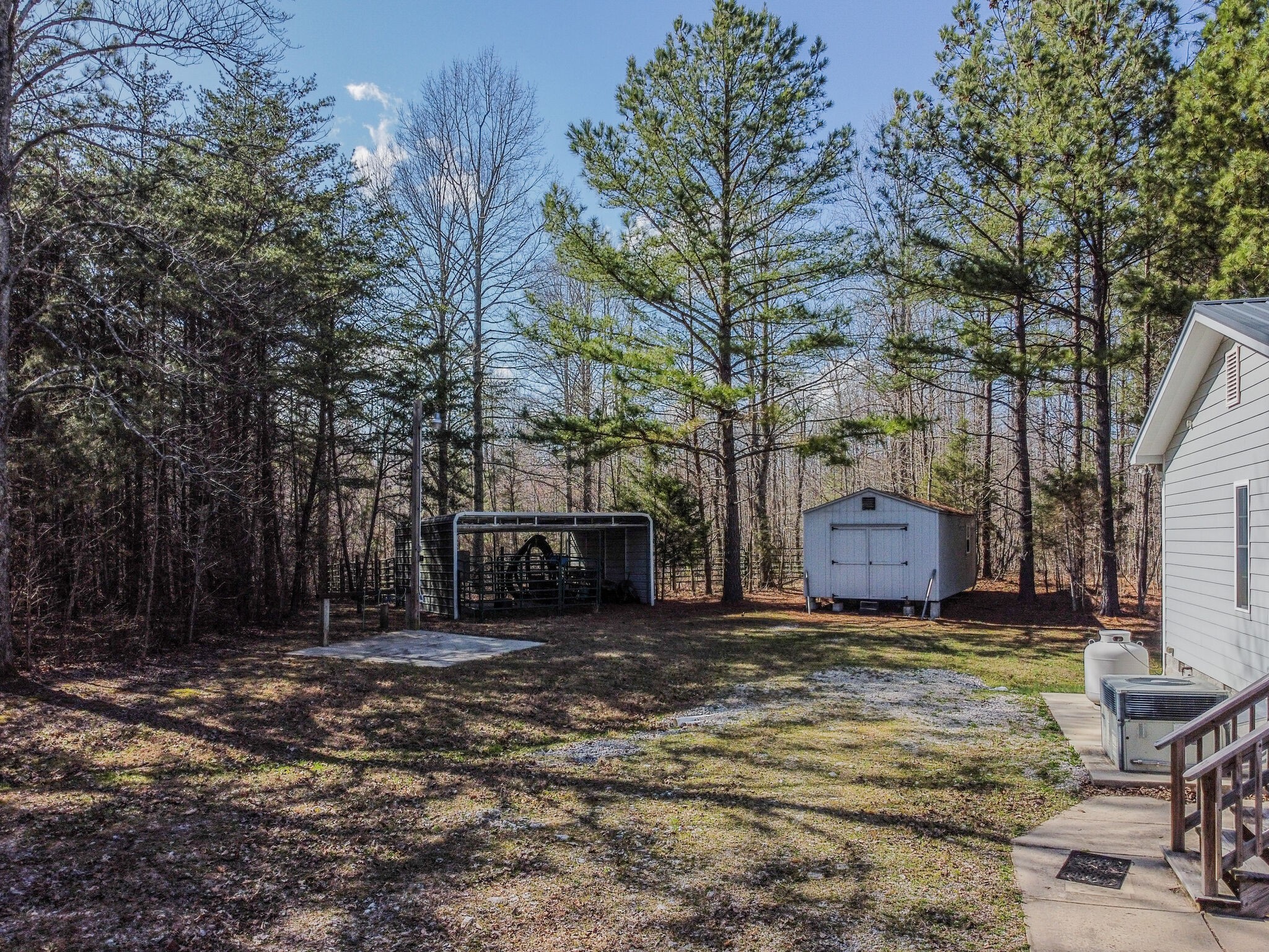 210 Double Check Lane Belvidere, TN 37306 - Photo 45 of 48 a view of a house with a yard