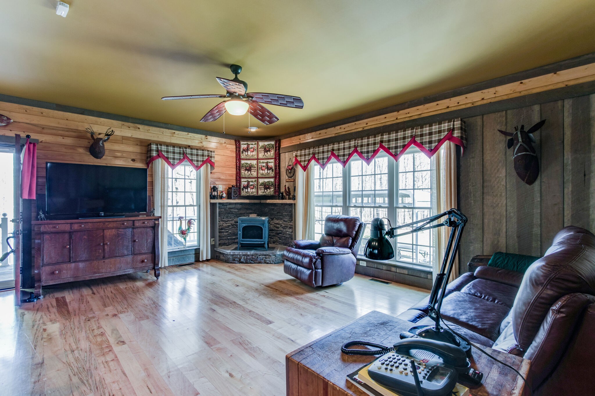 210 Double Check Lane Belvidere, TN 37306 - Photo 6 of 48 a living room with furniture a flat screen tv and a fireplace