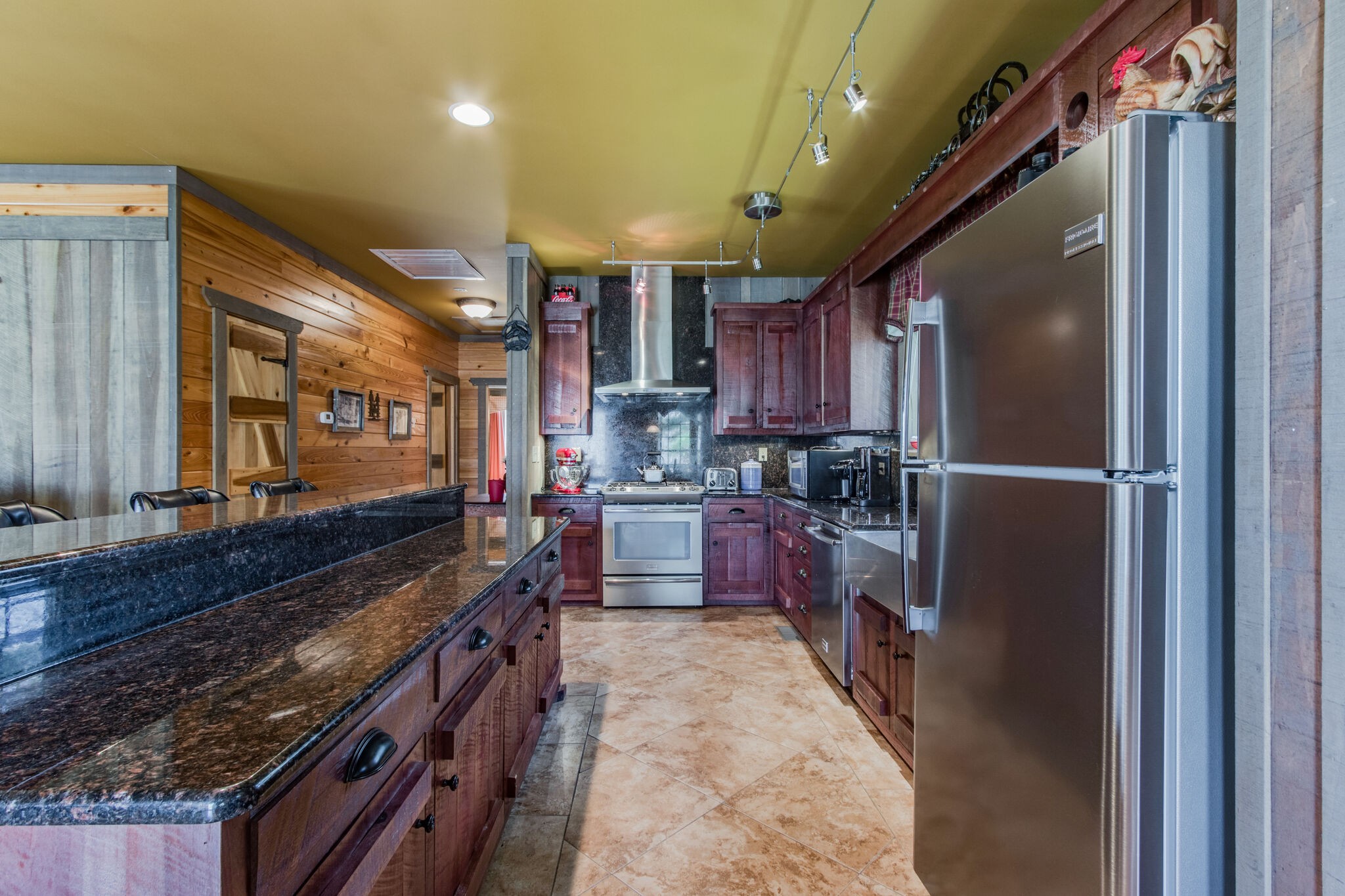 210 Double Check Lane Belvidere, TN 37306 - Photo 10 of 48 a kitchen with refrigerator a counter space and wooden floor