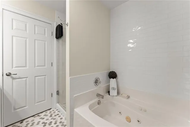 a bathroom with a sink and a shower