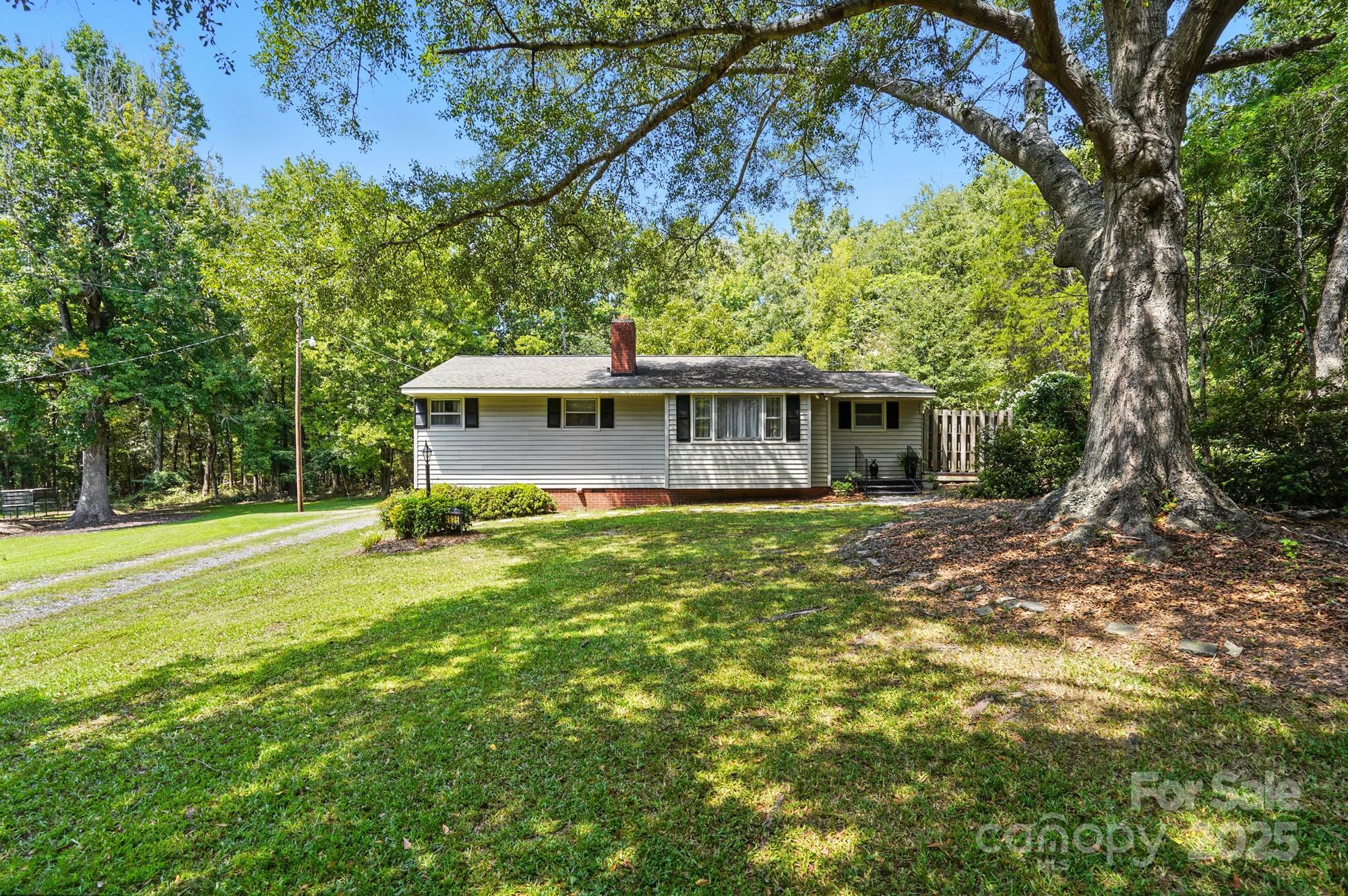 4825 Edgeland Road Edgemoor, SC 29712 - Photo 2 of 34 a view of a house with a yard