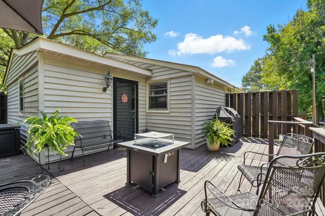 a view of outdoor sitting area with furniture