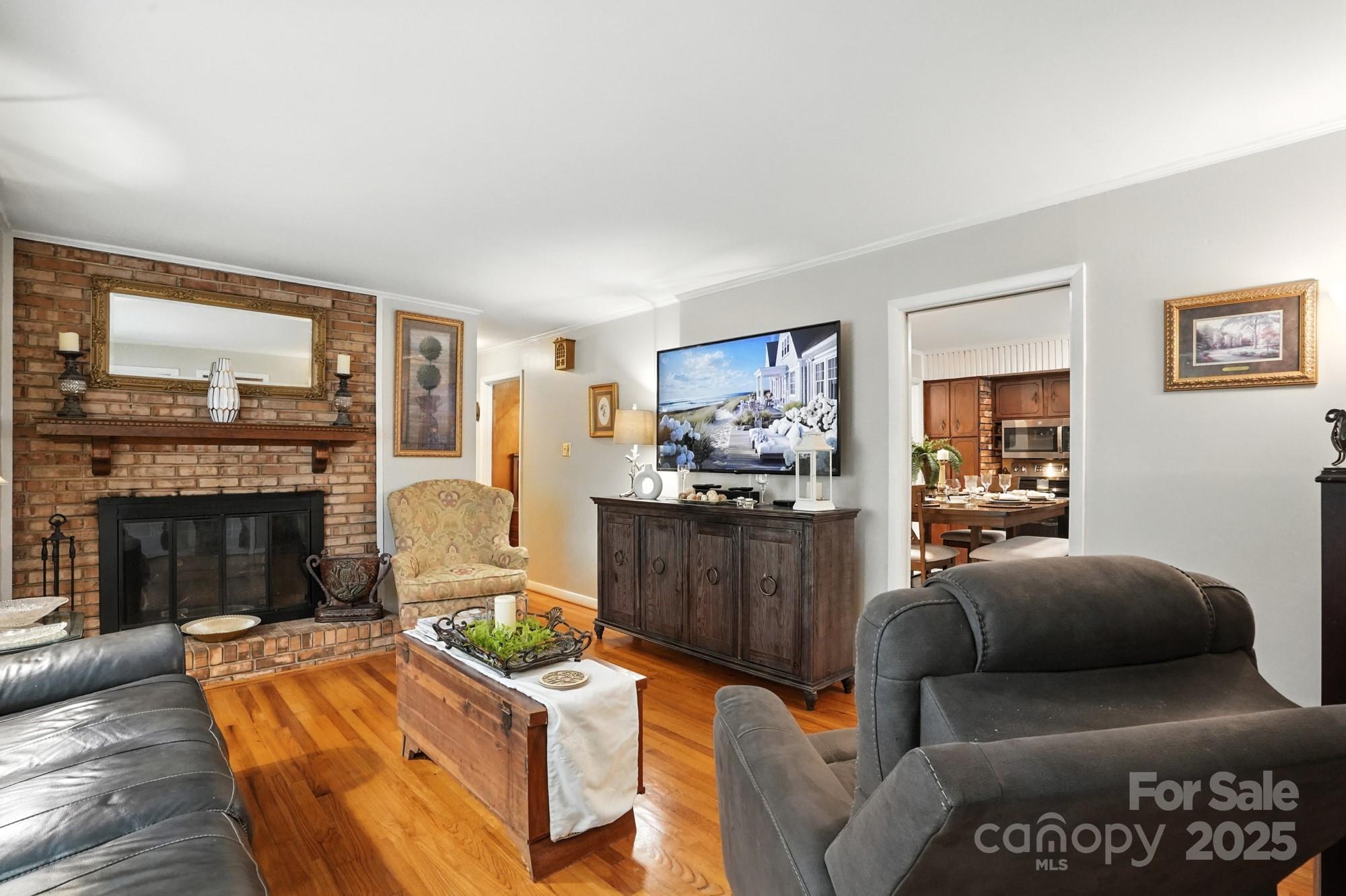 4825 Edgeland Road Edgemoor, SC 29712 - Photo 4 of 34 a living room with furniture and a fireplace