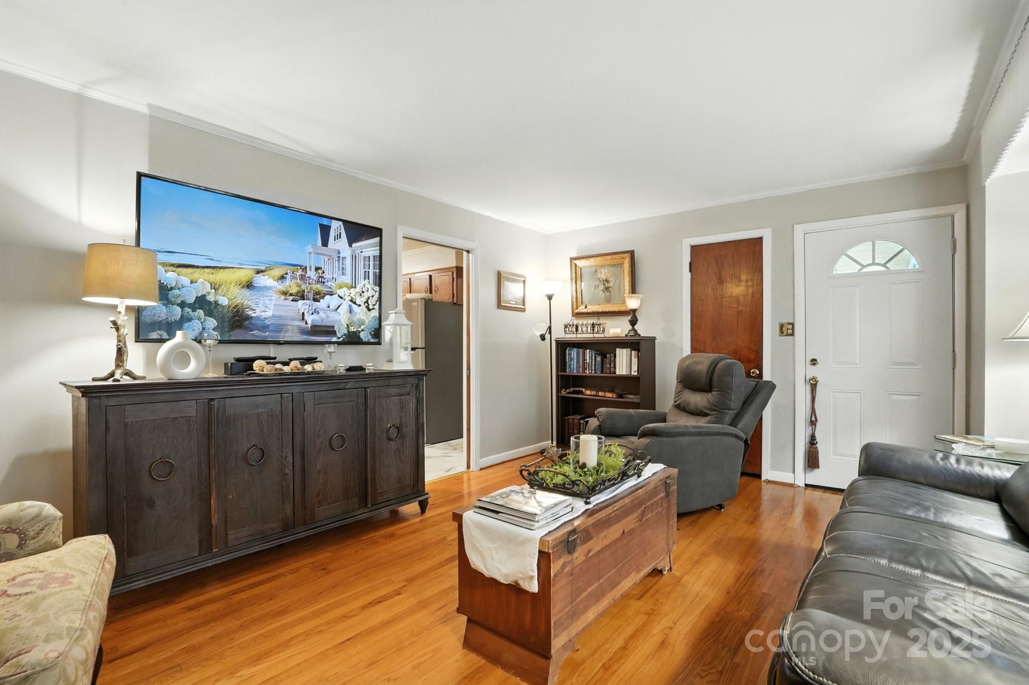 4825 Edgeland Road Edgemoor, SC 29712 - Photo 5 of 34 a living room with furniture and a wooden floor