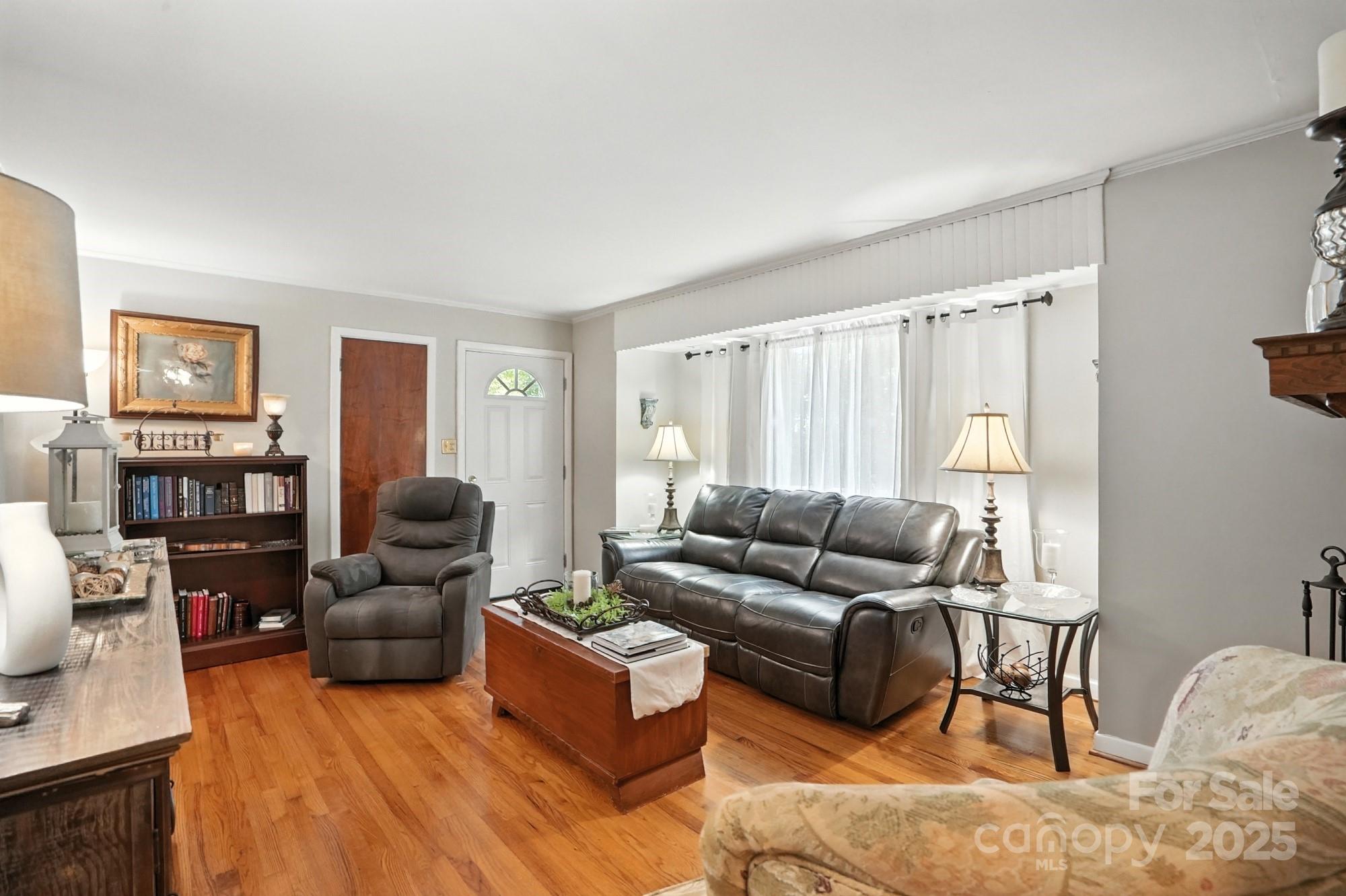 4825 Edgeland Road Edgemoor, SC 29712 - Photo 6 of 34 a living room with furniture and a flat screen tv