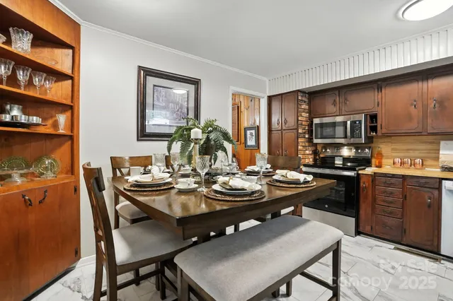 a view of a dining room with furniture