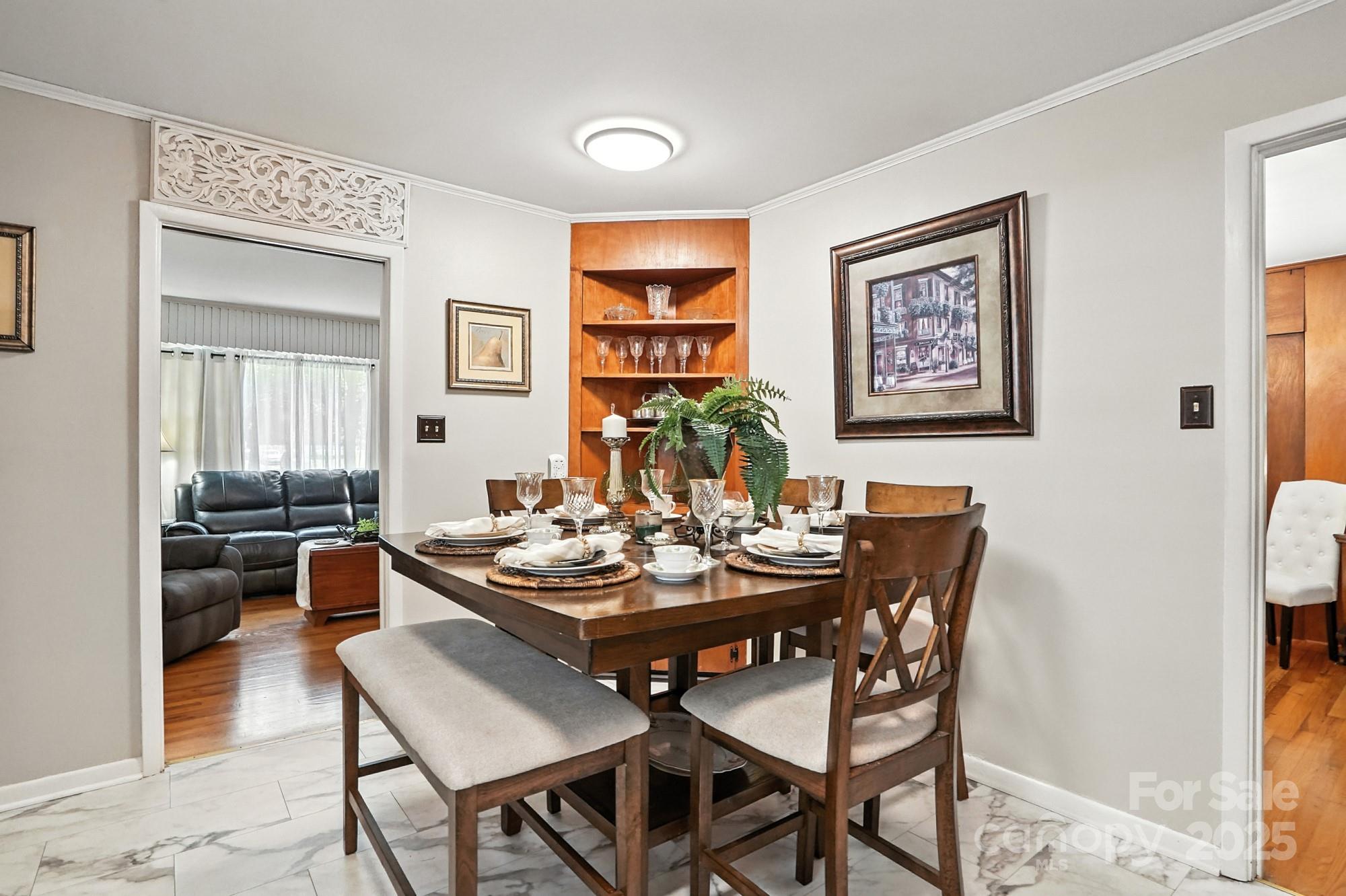 4825 Edgeland Road Edgemoor, SC 29712 - Photo 10 of 34 a view of a dining room with furniture and wooden floor