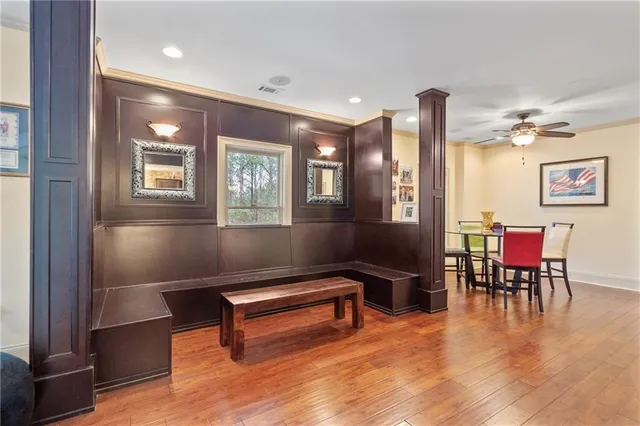 a lobby with furniture and window