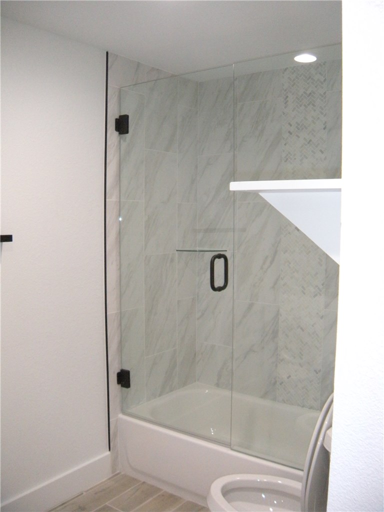 2529 Rio Grande Street, Unit 79 Austin, TX 78705 - Photo 8 of 13 a bathroom with a shower