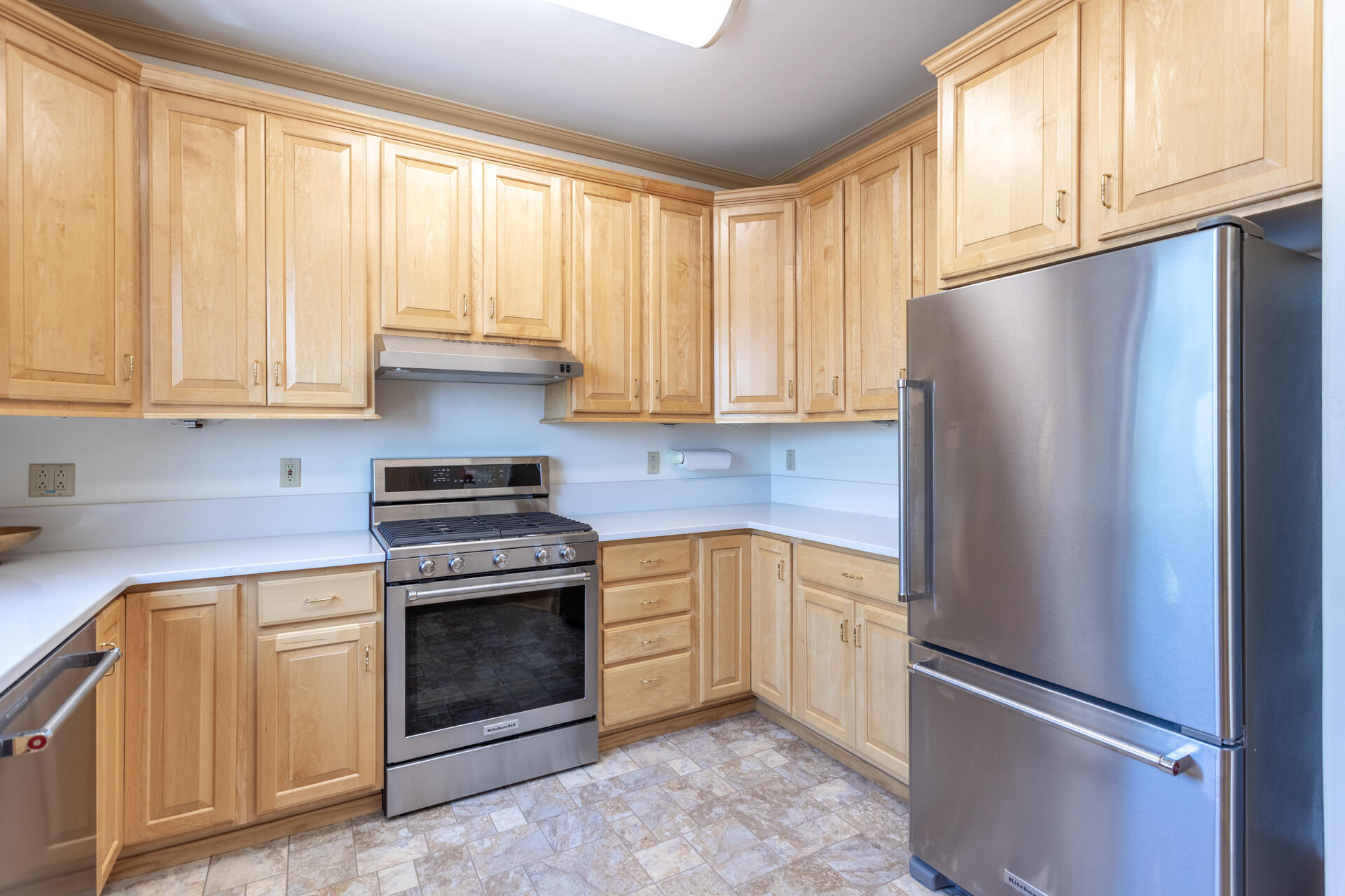 6360 Wilson Hill Road Shingletown, CA 96088 - Photo 13 of 79 a kitchen with cabinets and stainless steel appliances