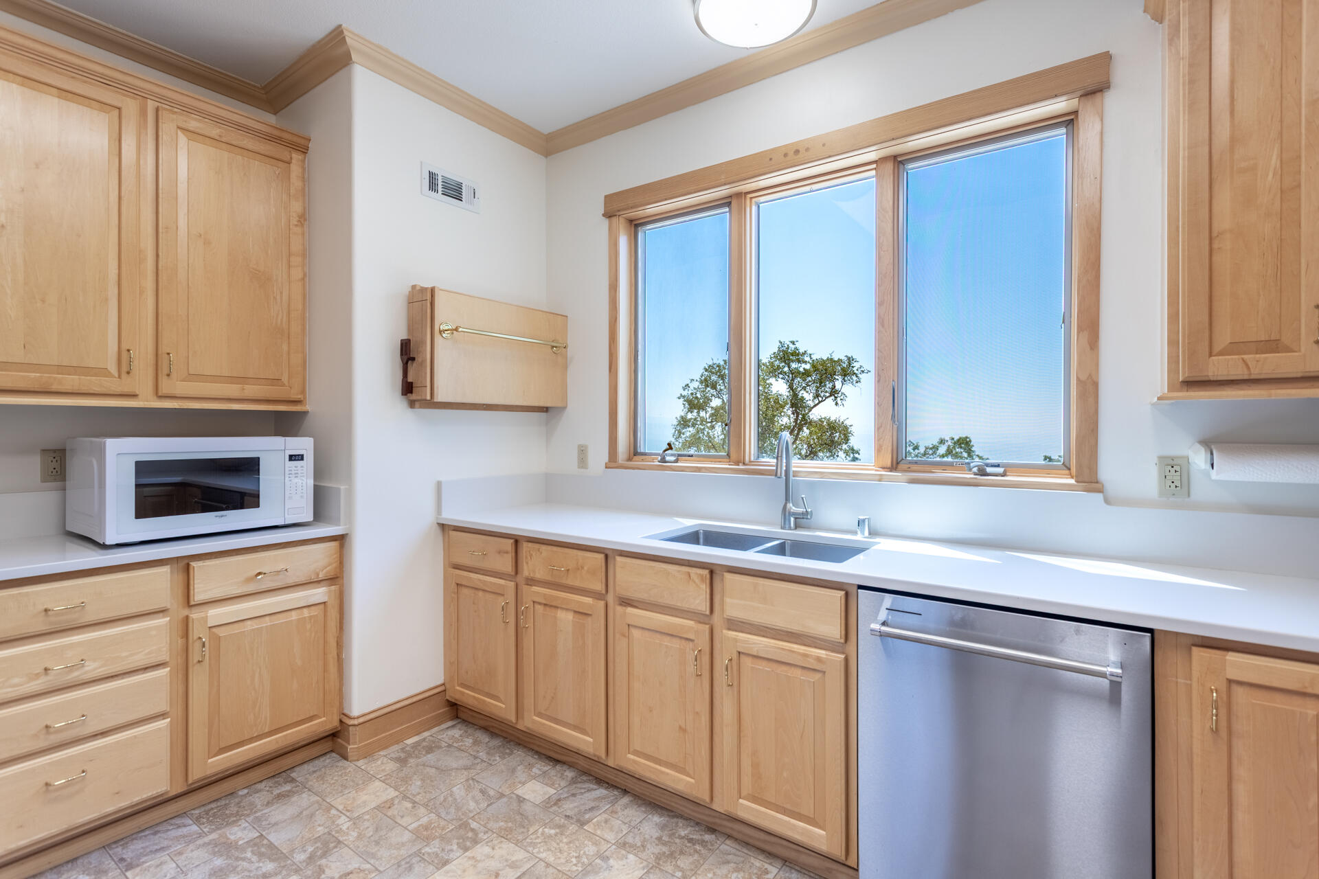 6360 Wilson Hill Road Shingletown, CA 96088 - Photo 14 of 79 a kitchen with a sink and large window