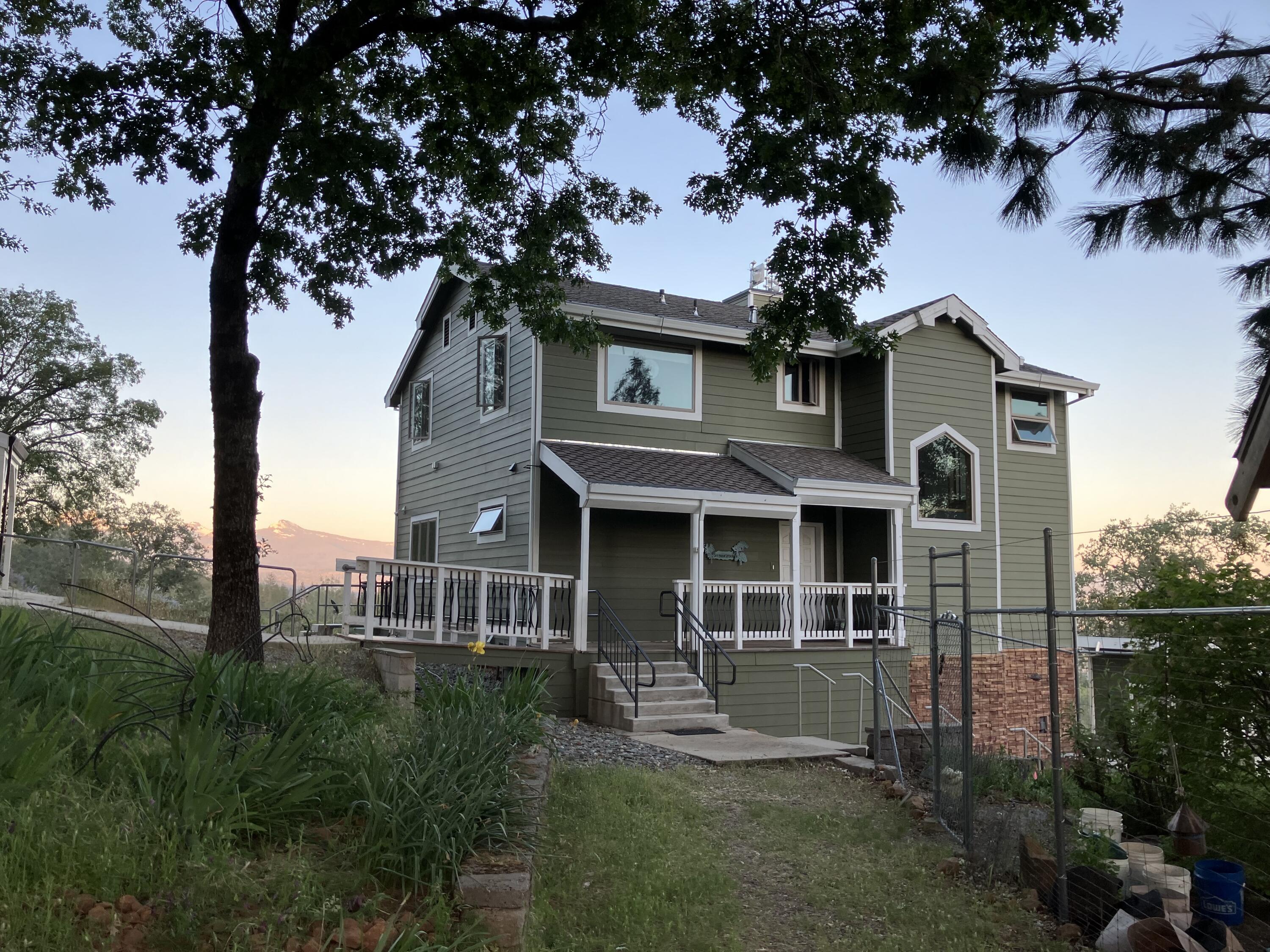 6360 Wilson Hill Road Shingletown, CA 96088 - Photo 2 of 79 a front view of a house with garden