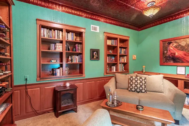 a view of a house with a tree in the background