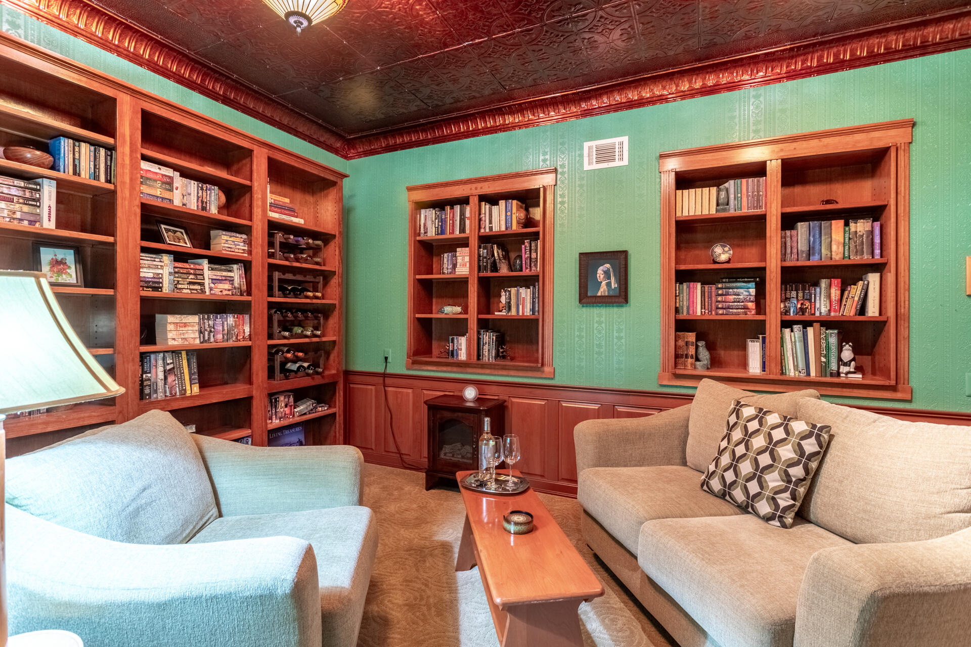 6360 Wilson Hill Road Shingletown, CA 96088 - Photo 29 of 79 a living room with furniture and a book shelf