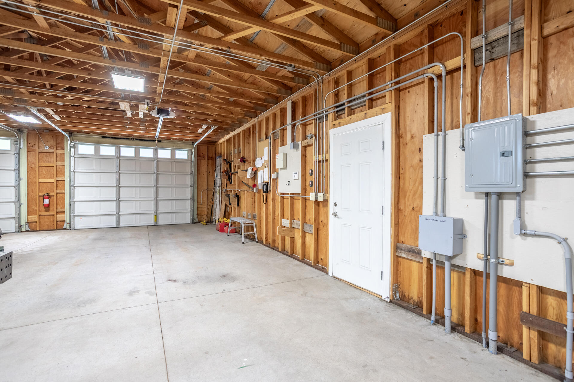 6360 Wilson Hill Road Shingletown, CA 96088 - Photo 42 of 79 a view of an empty room with wooden walls