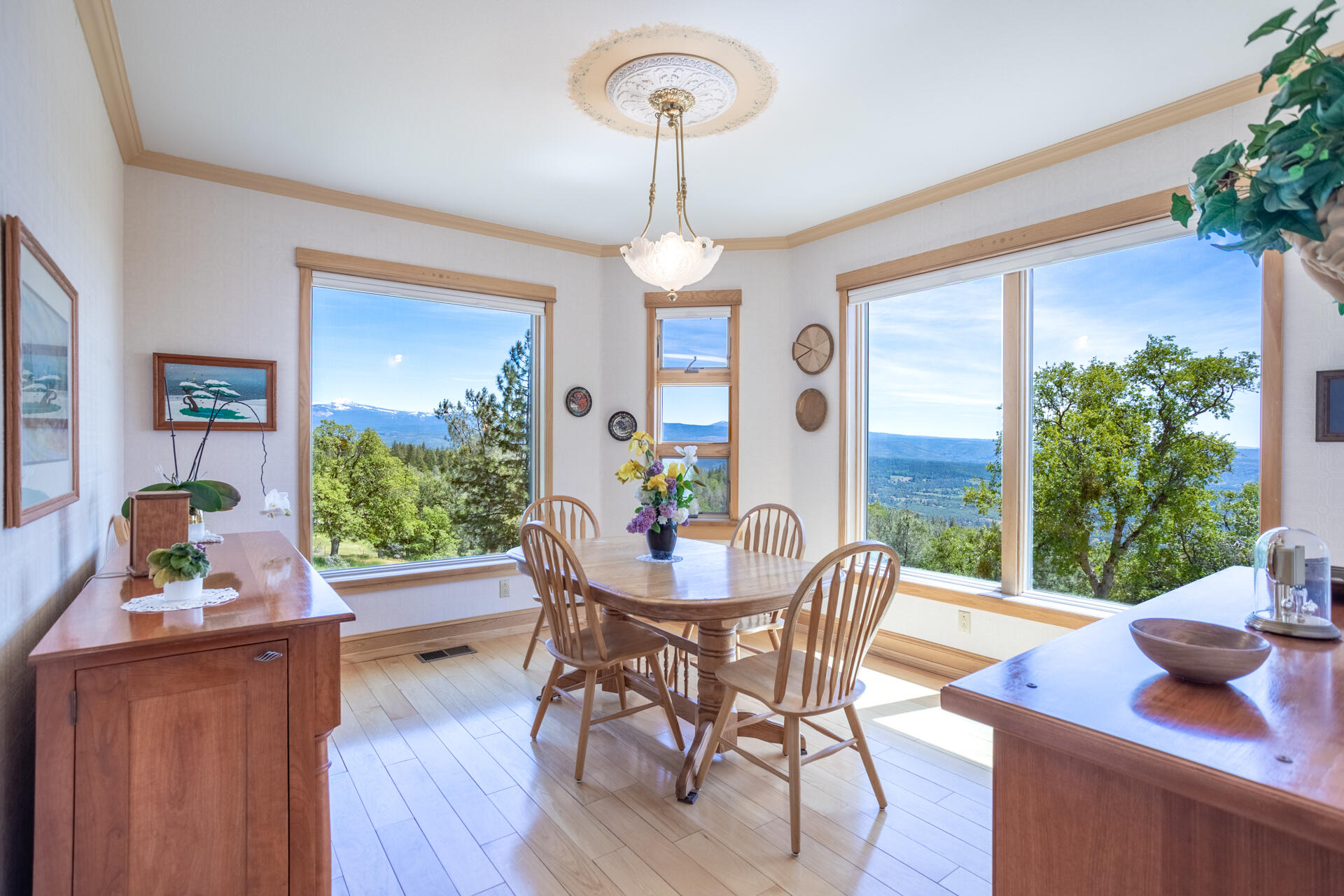 6360 Wilson Hill Road Shingletown, CA 96088 - Photo 10 of 79 a view of a dining room with furniture window and wooden floor