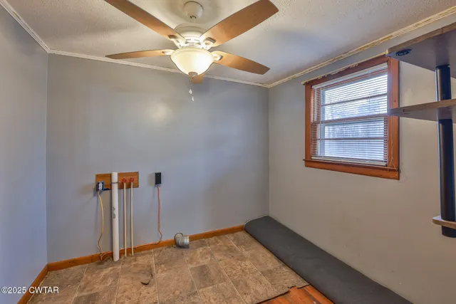 a view of a hallway with a chandelier