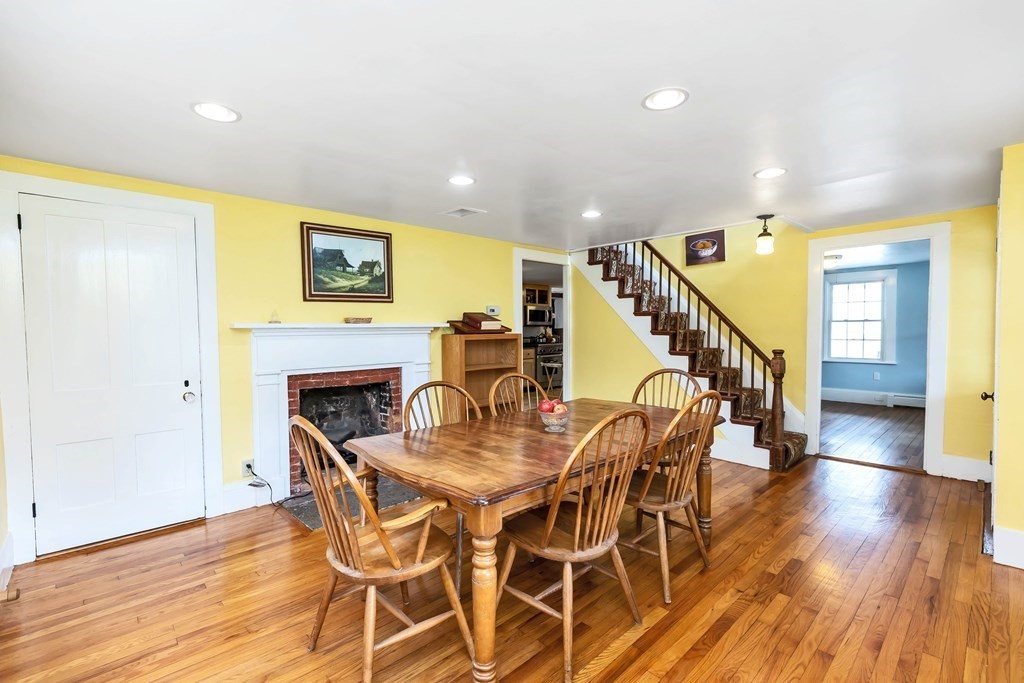 47 Taylor Road New Ipswich, NH 03071 - Photo 16 of 33 a dining room with furniture and wooden floor