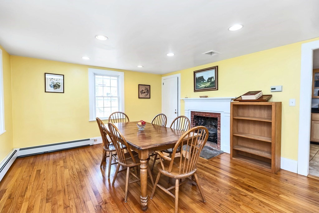 47 Taylor Road New Ipswich, NH 03071 - Photo 17 of 33 a dining room with furniture and wooden floor