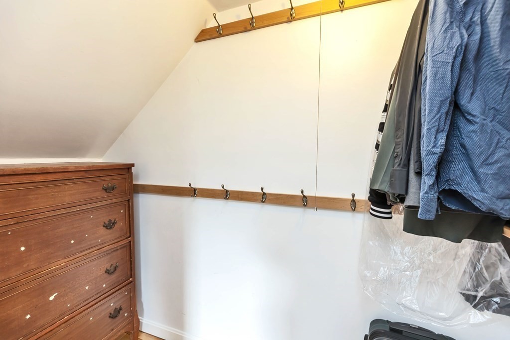 47 Taylor Road New Ipswich, NH 03071 - Photo 24 of 33 a view of walk in closet with clothes and shoes