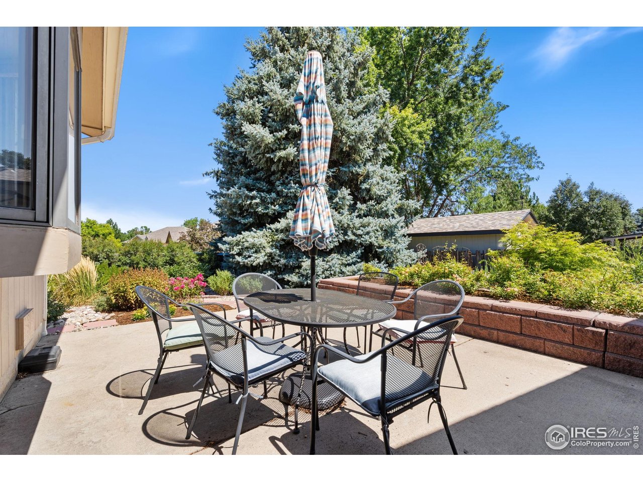 4331 West 16th Street Road Greeley, CO 80634 - Photo 32 of 41 Backyard Patio, Table/Chairs Included