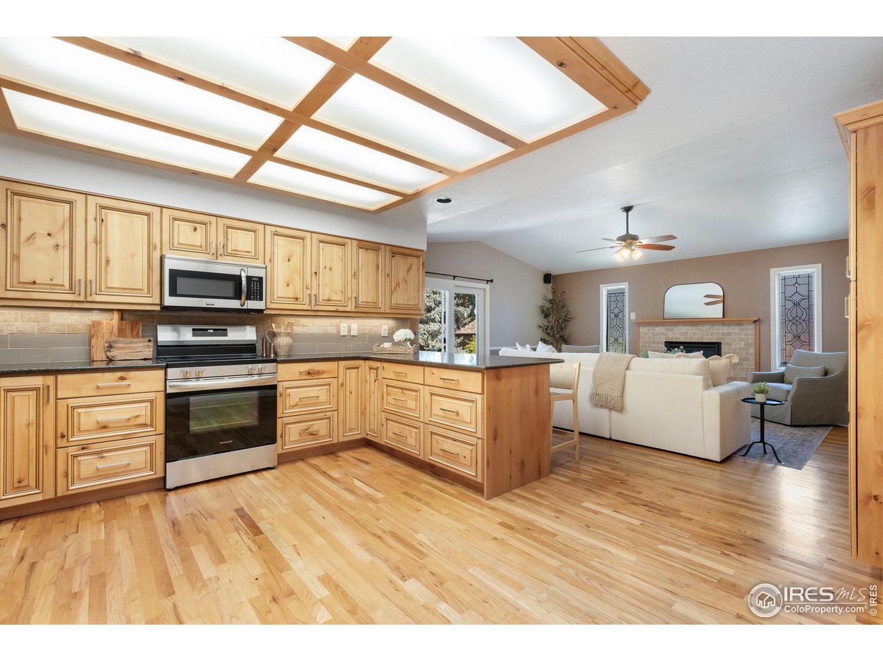 4331 West 16th Street Road Greeley, CO 80634 - Photo 9 of 41 Custom Kitchen with Milarc Cabinetry and Granite Counters