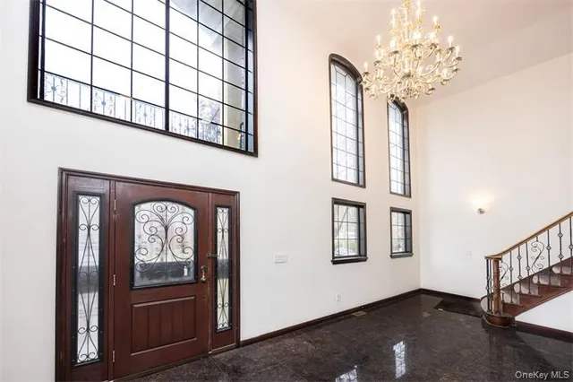 an entryway view with staircase