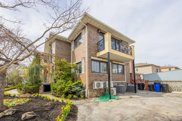 a front view of a building with garden