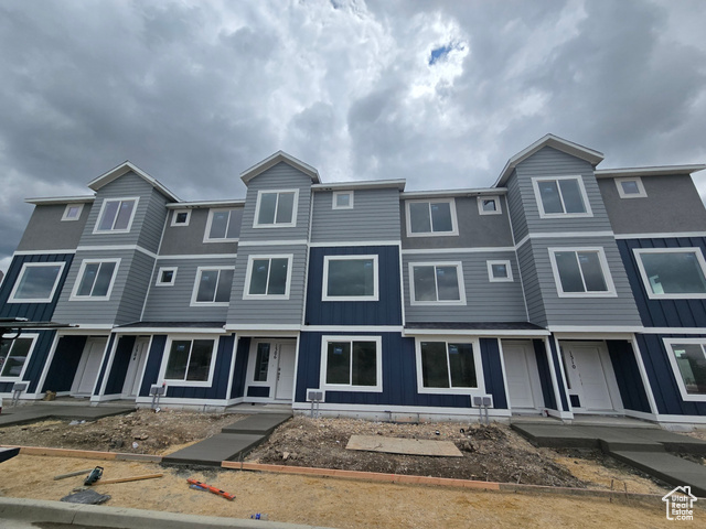 1306 North 375th Street East, Unit 138 Ogden, UT 84404 - Photo 1 of 1 Townhome / multi-family property featuring board and batten siding