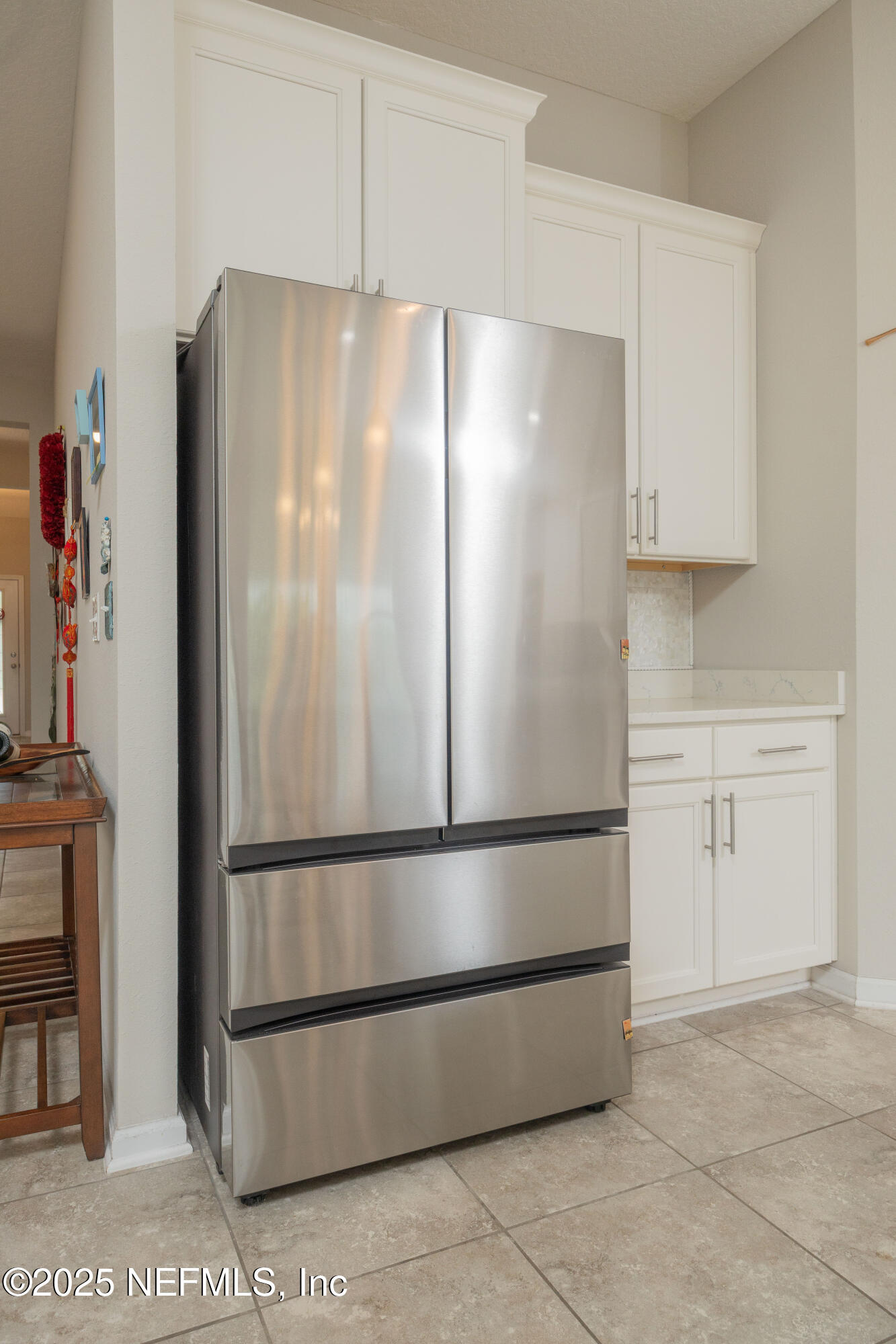 333 Old Hickory Forest Road St. Augustine, FL 32084 - Photo 17 of 62 a white refrigerator freezer sitting in a kitchen