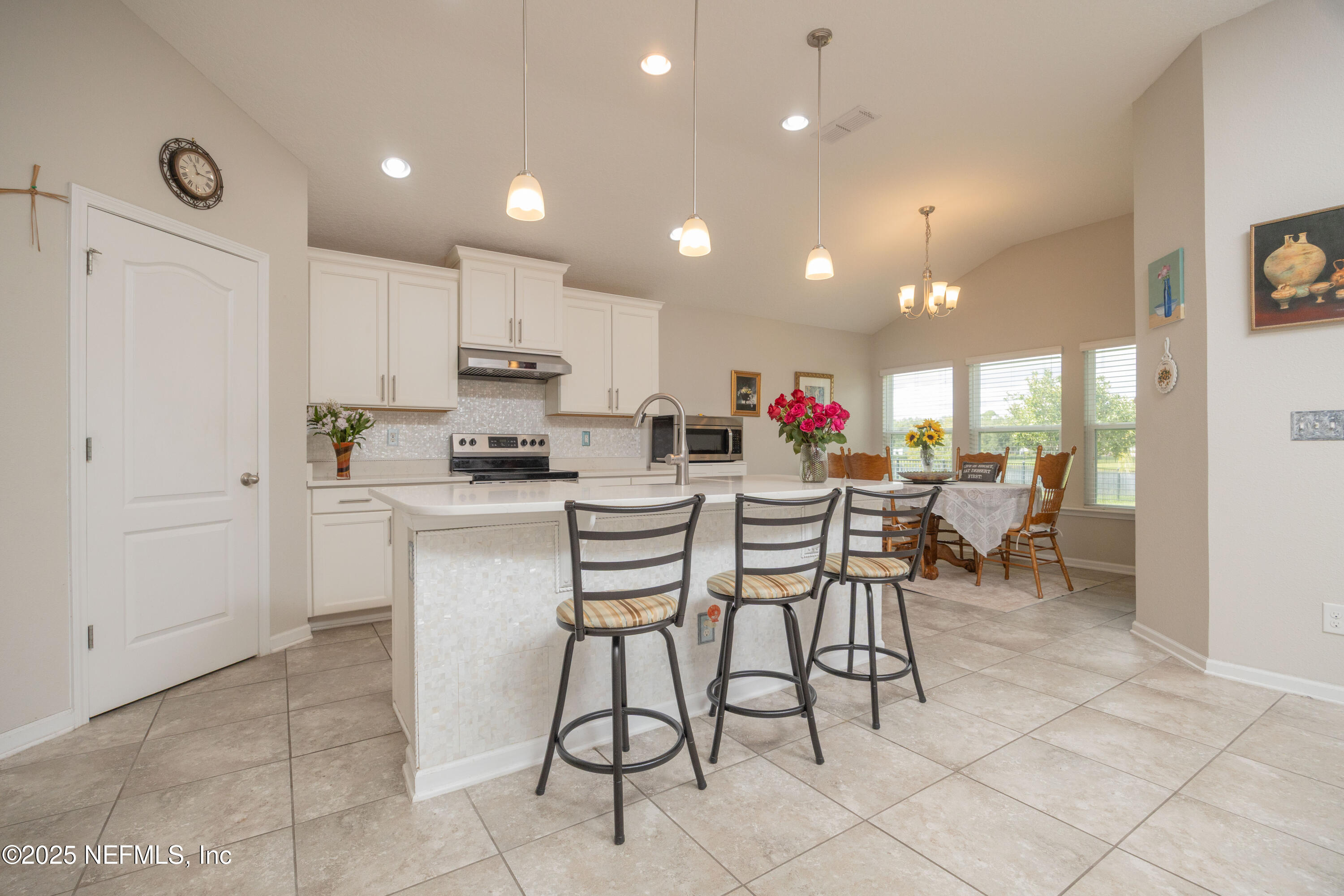 333 Old Hickory Forest Road St. Augustine, FL 32084 - Photo 18 of 62 a kitchen with a sink cabinets and window