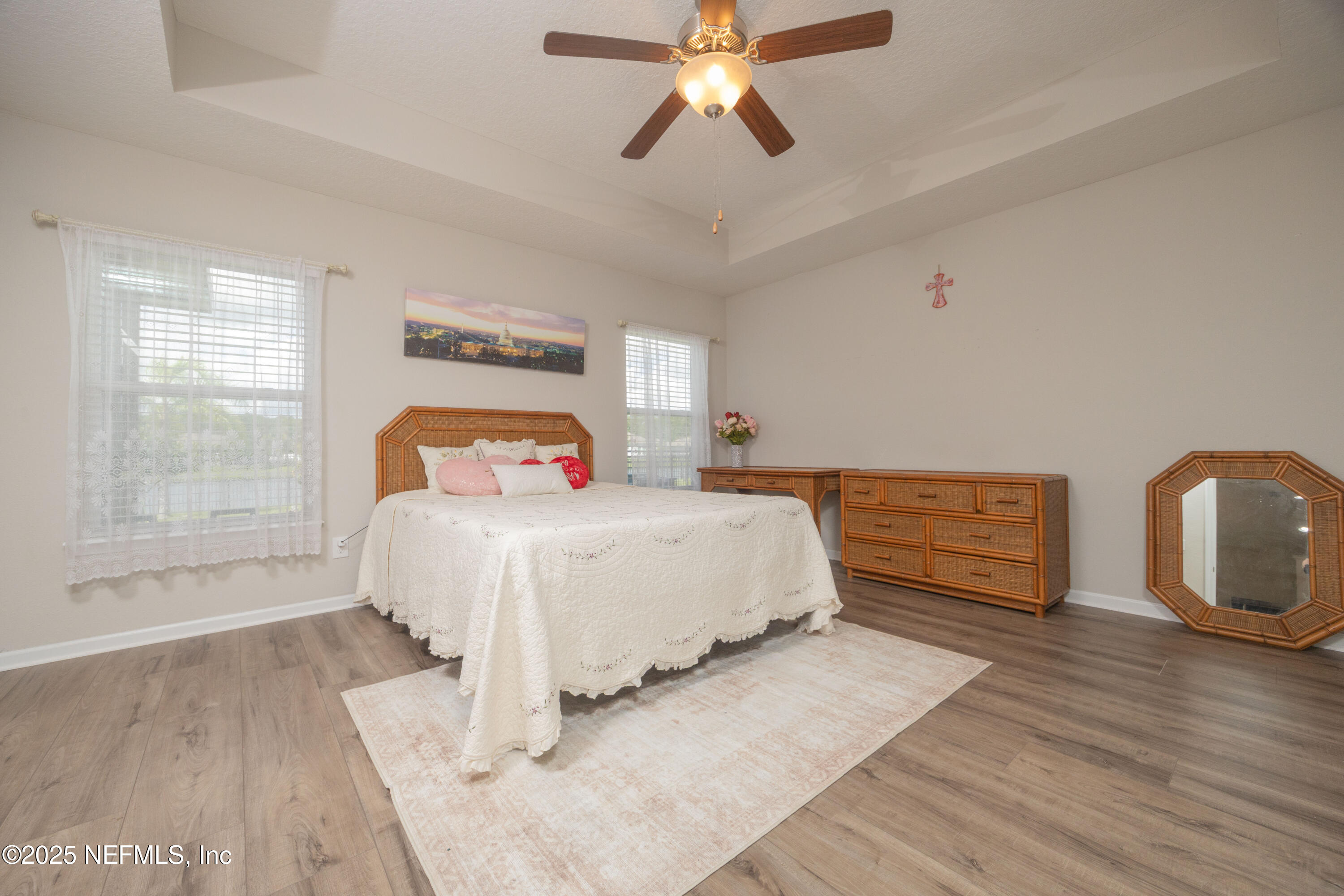 333 Old Hickory Forest Road St. Augustine, FL 32084 - Photo 20 of 62 a bedroom with a bed and wooden floor