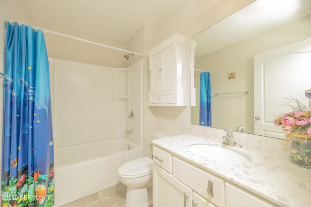 a view of a garden with a pathway