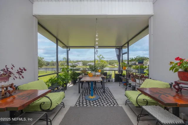 a view of an house with backyard space and porch